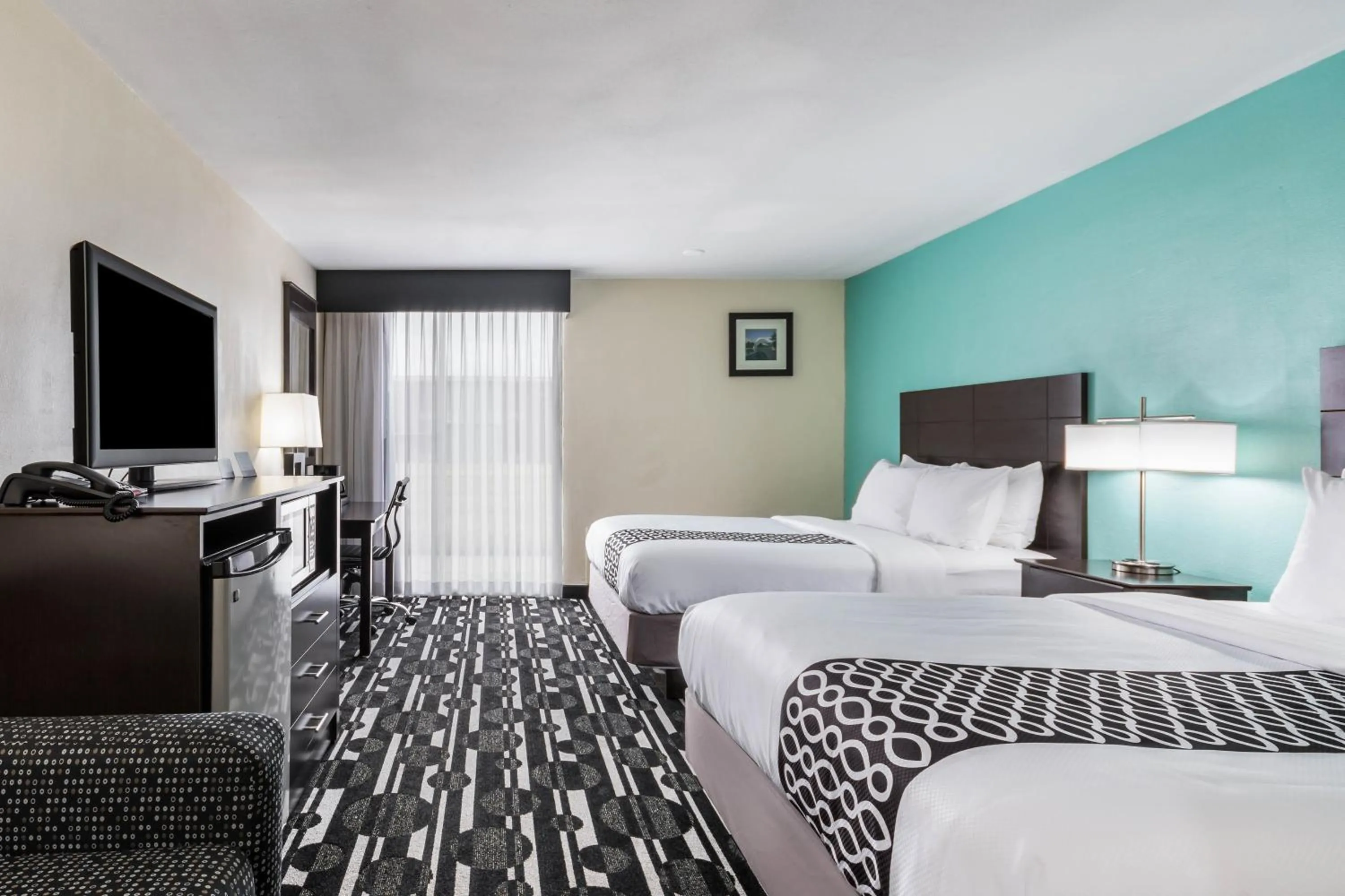 Photo of the whole room, Bed in Bricktown Hotel & Extended Stay