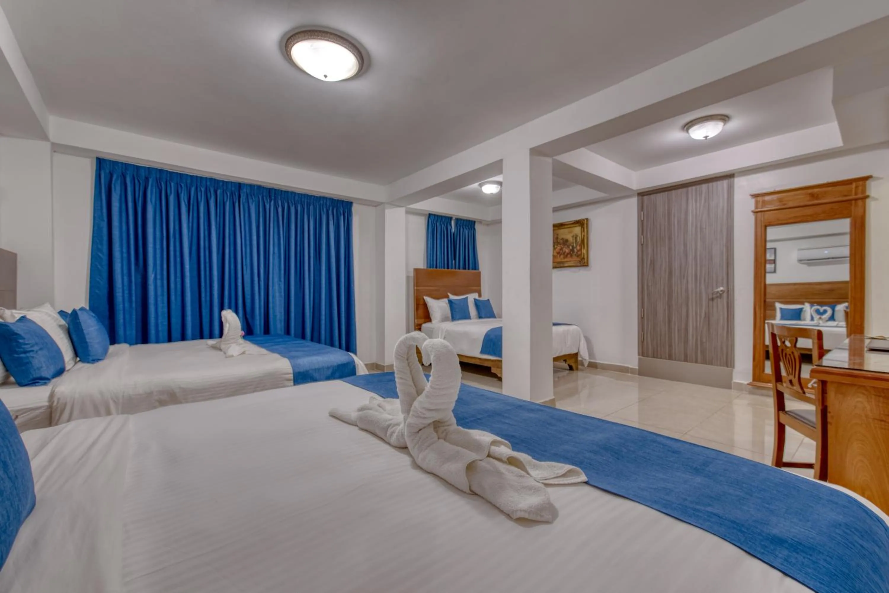 Bed in Swans Cay Hotel