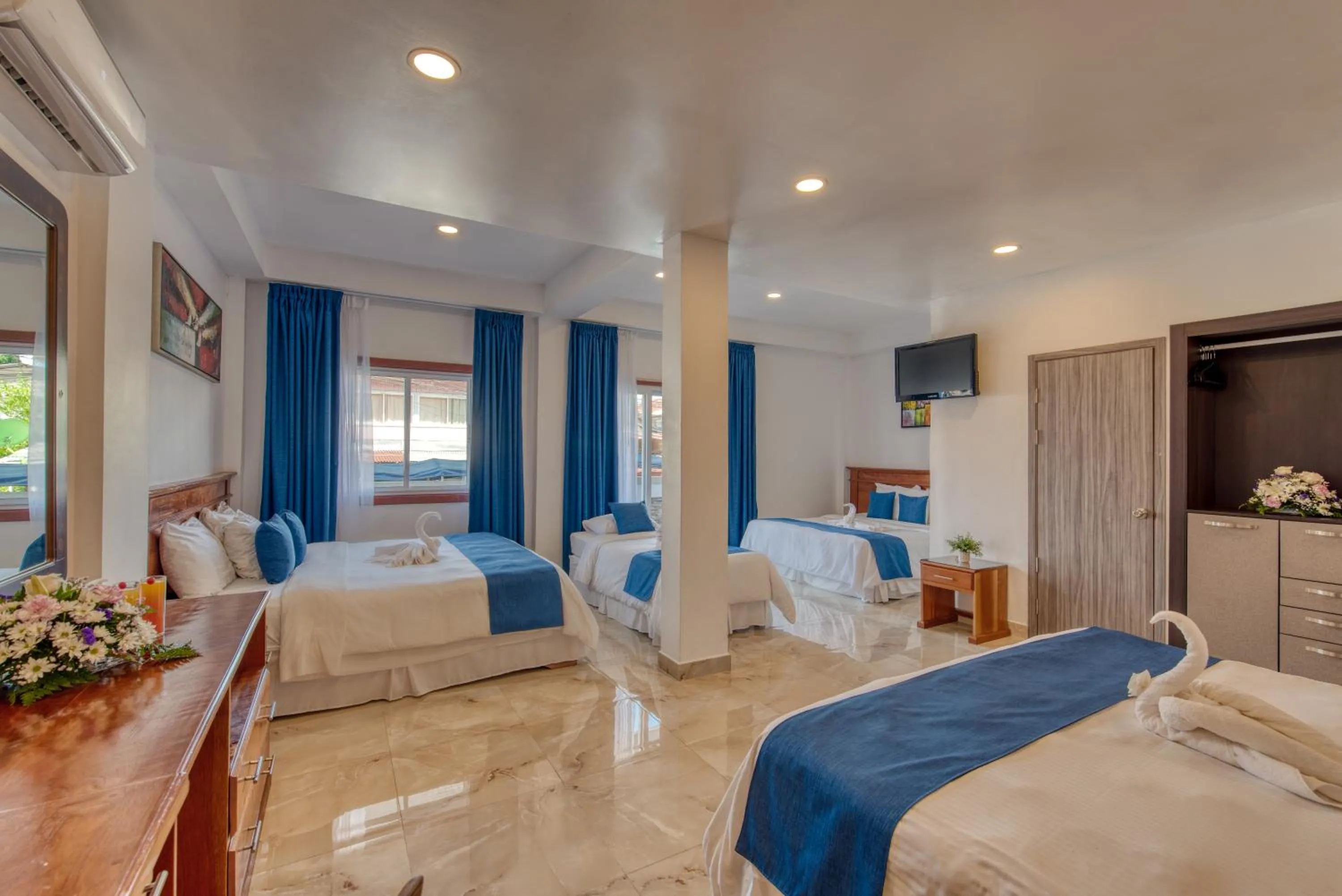 Bed in Swans Cay Hotel