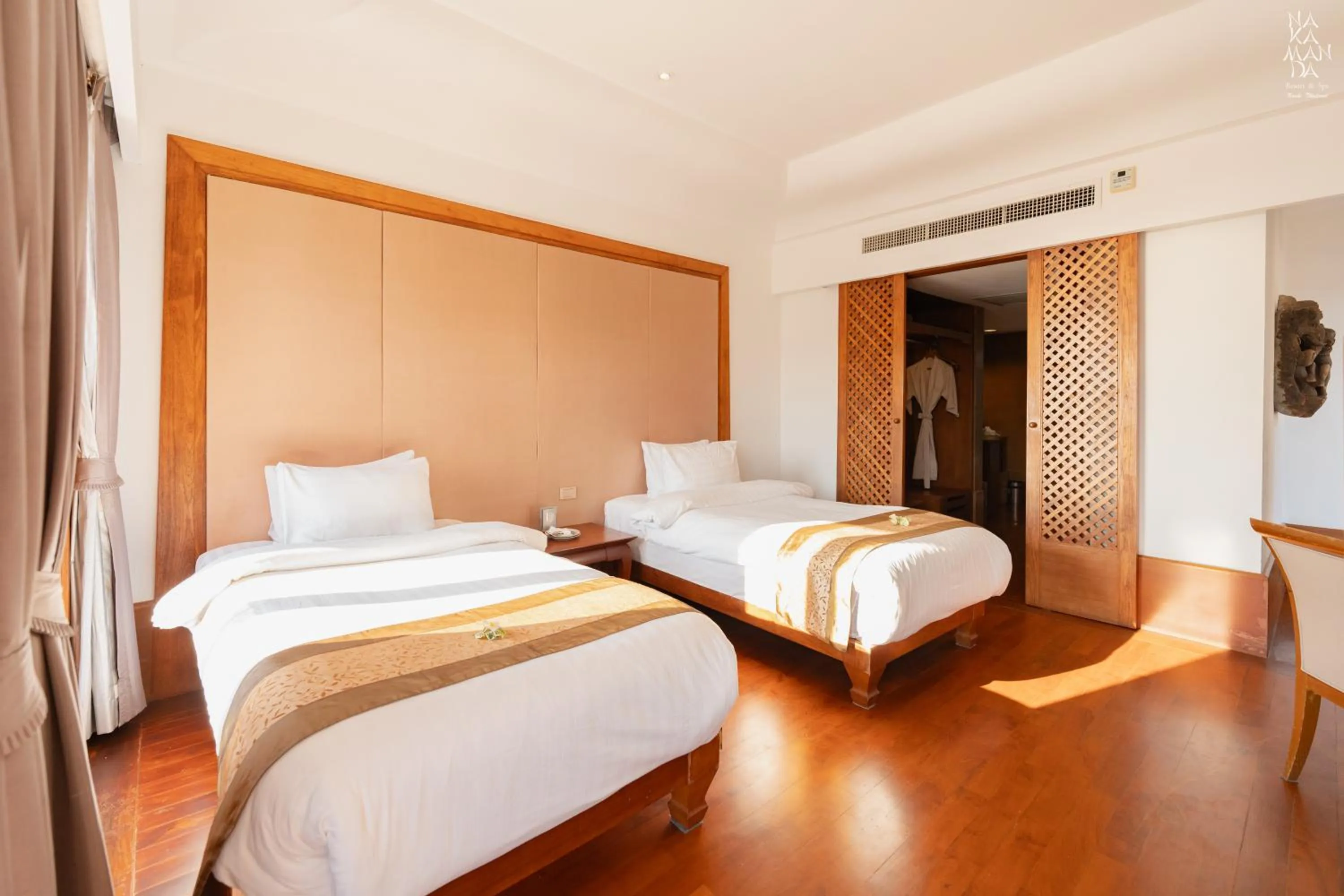 Bed in Nakamanda Resort and Spa