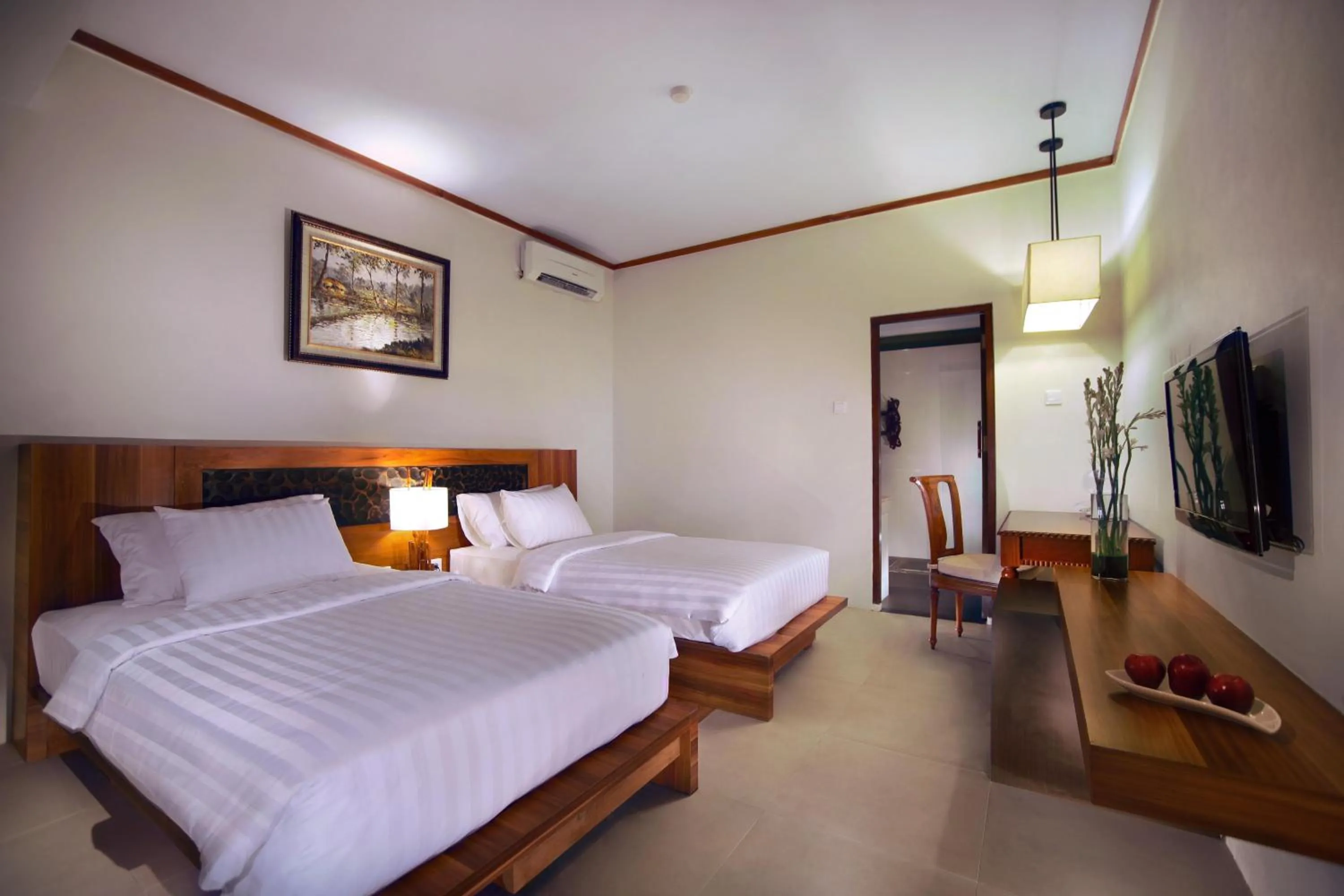 Photo of the whole room, Bed in Aston Sunset Beach Resort - Gili Trawangan