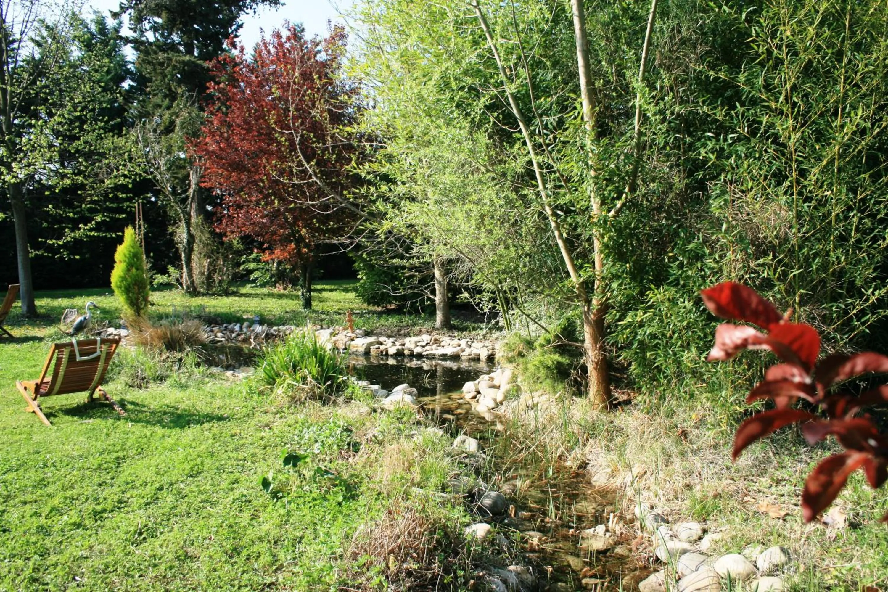 Garden view in Le Mas De La Cigale Bleue, Caumont Sur Durance