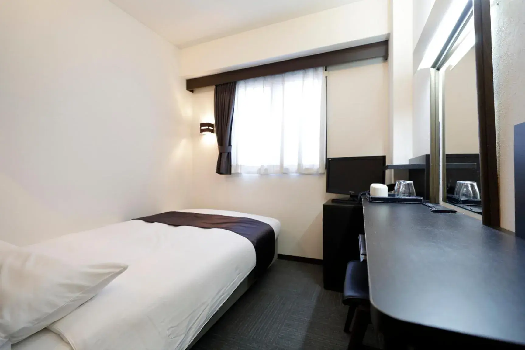 Bed in Tokyo Inn Bed in Tokyo Inn