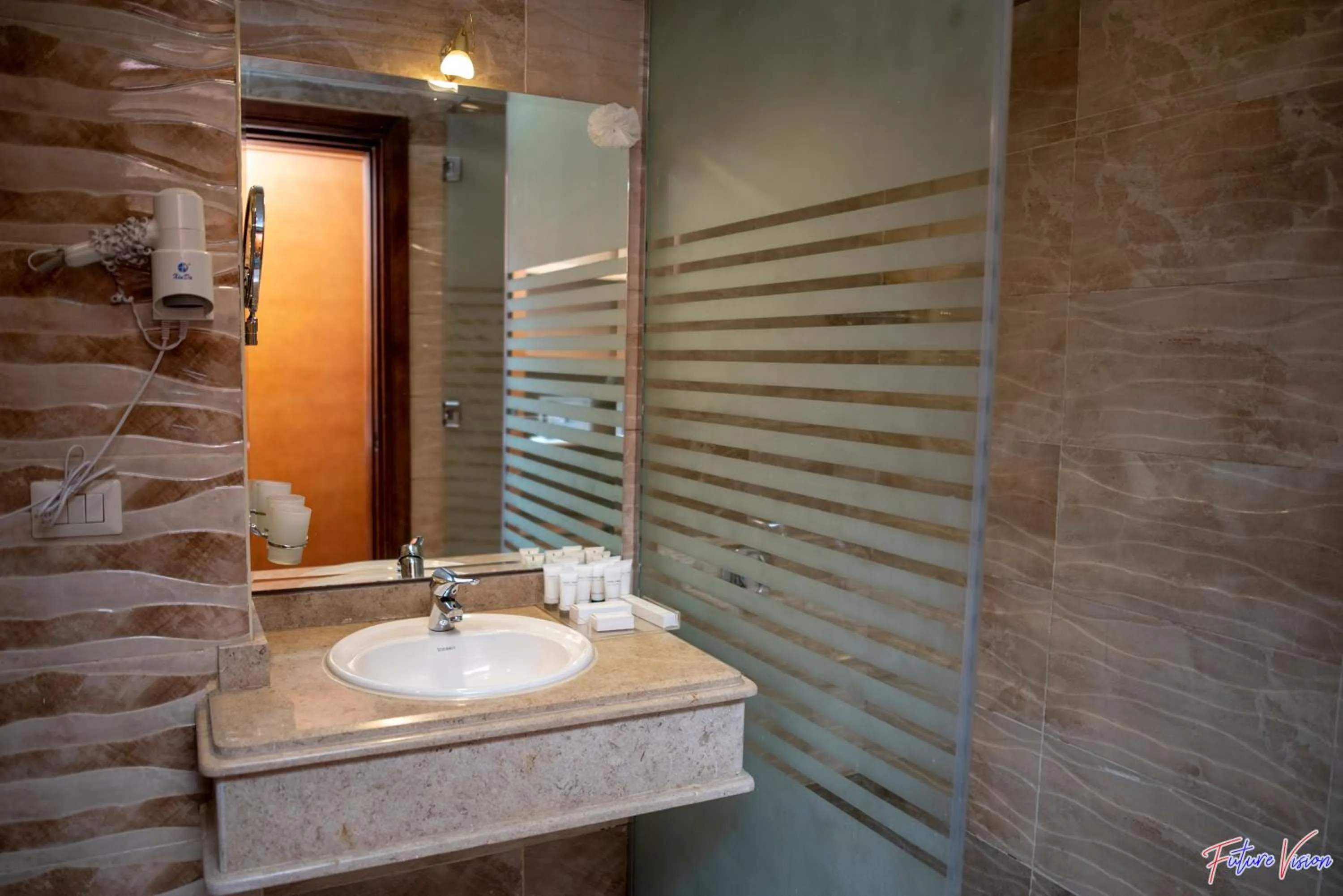 Bathroom in Rehana Plaza Hotel