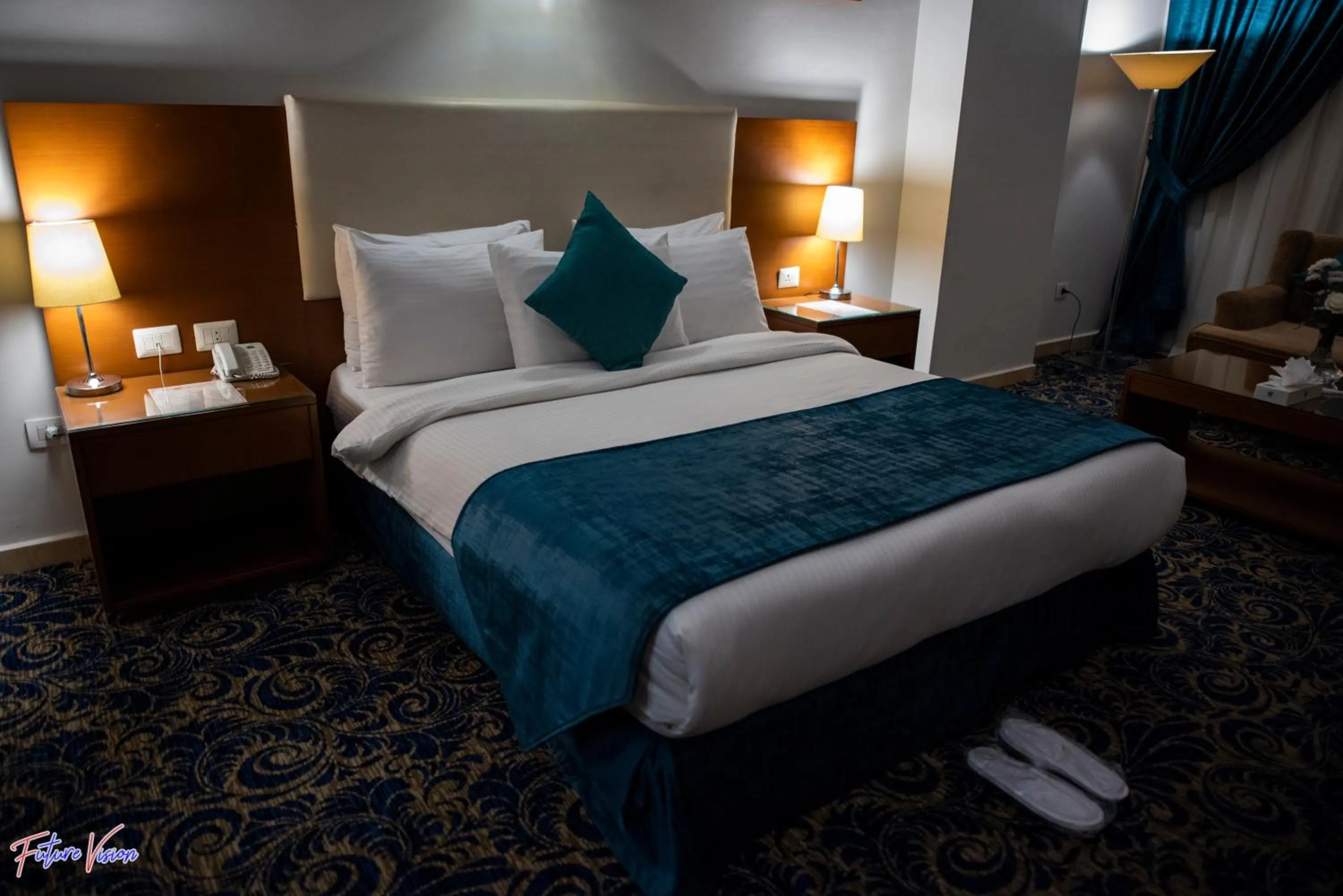 Bed in Rehana Plaza Hotel