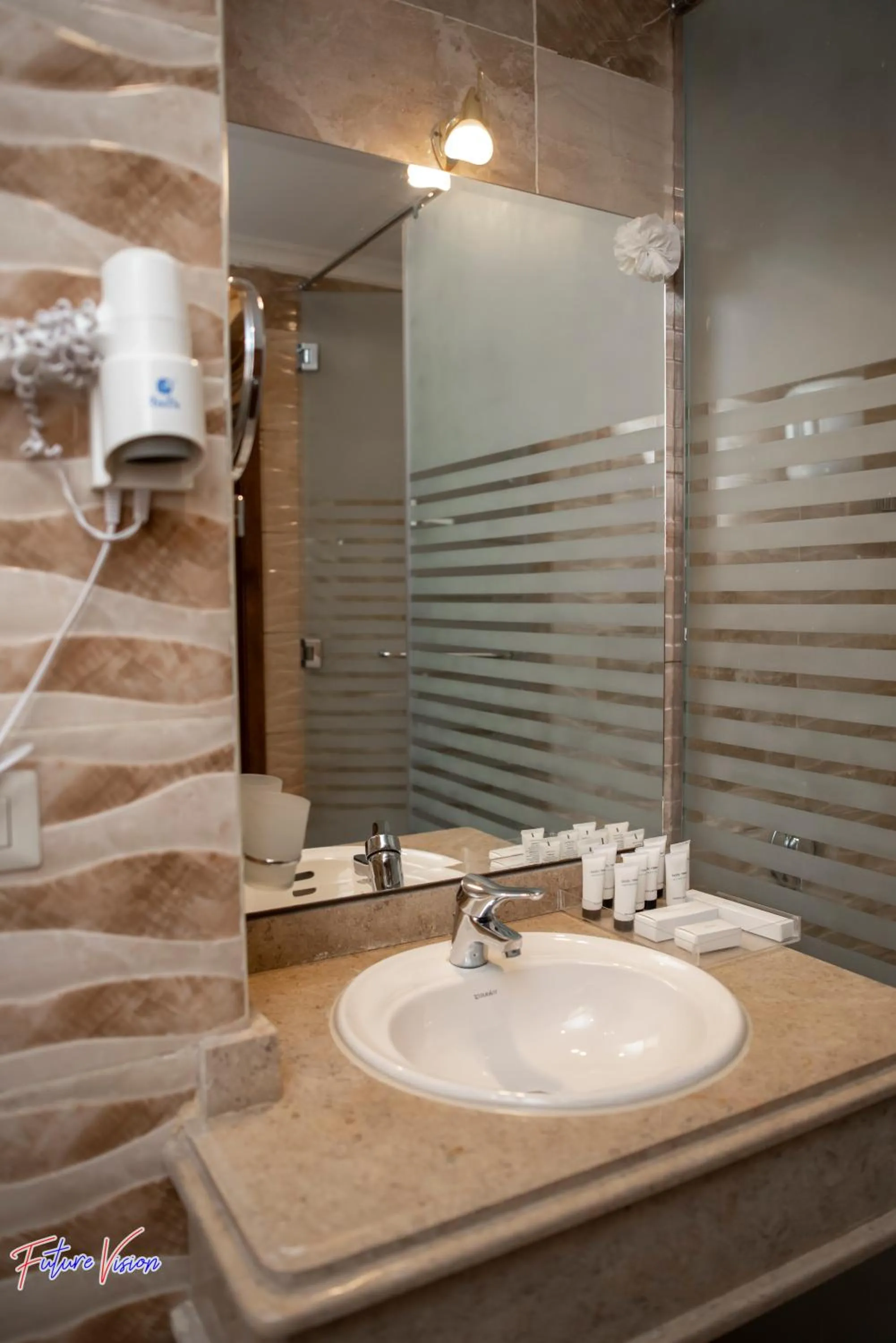 Bathroom in Rehana Plaza Hotel