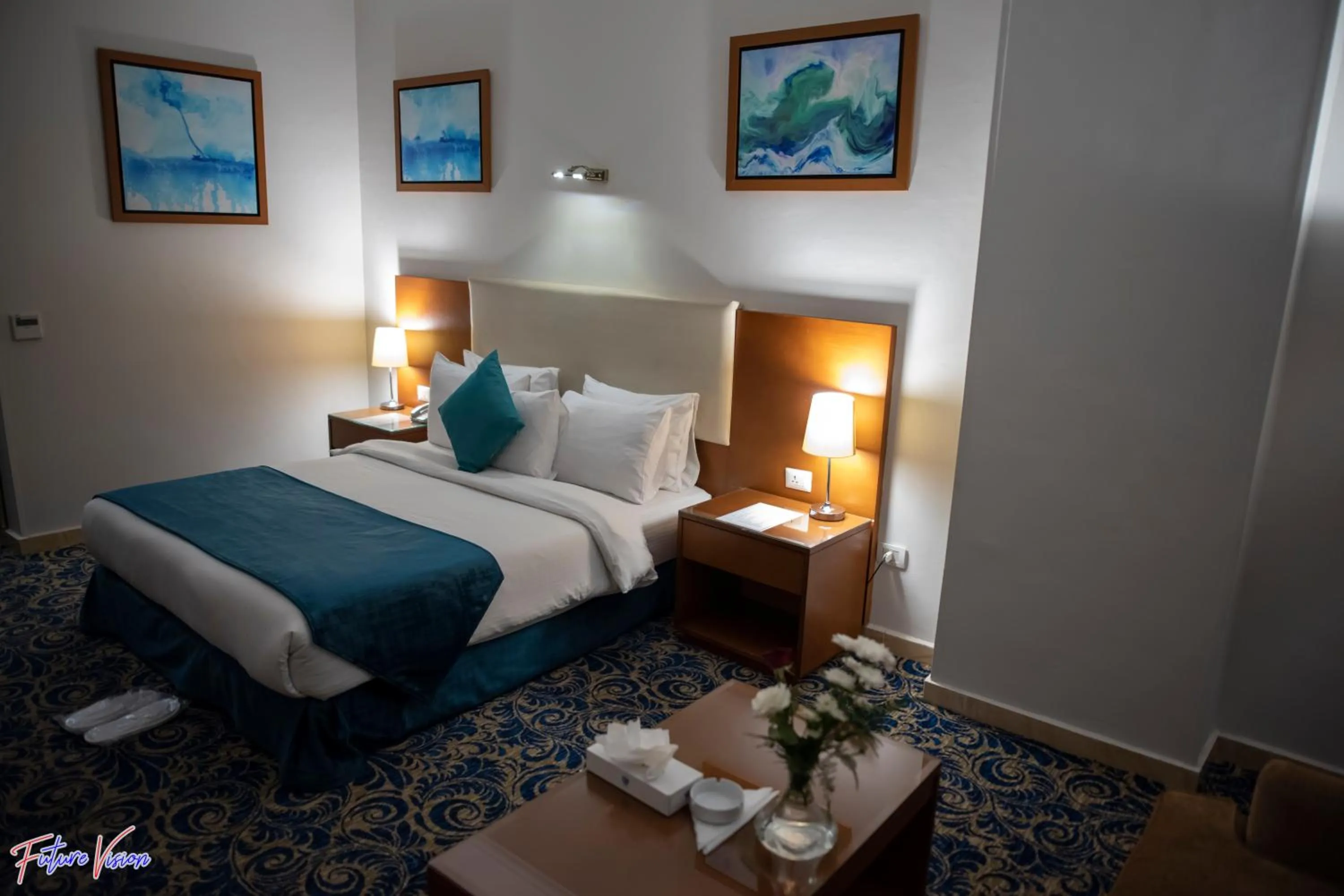 Bed in Rehana Plaza Hotel