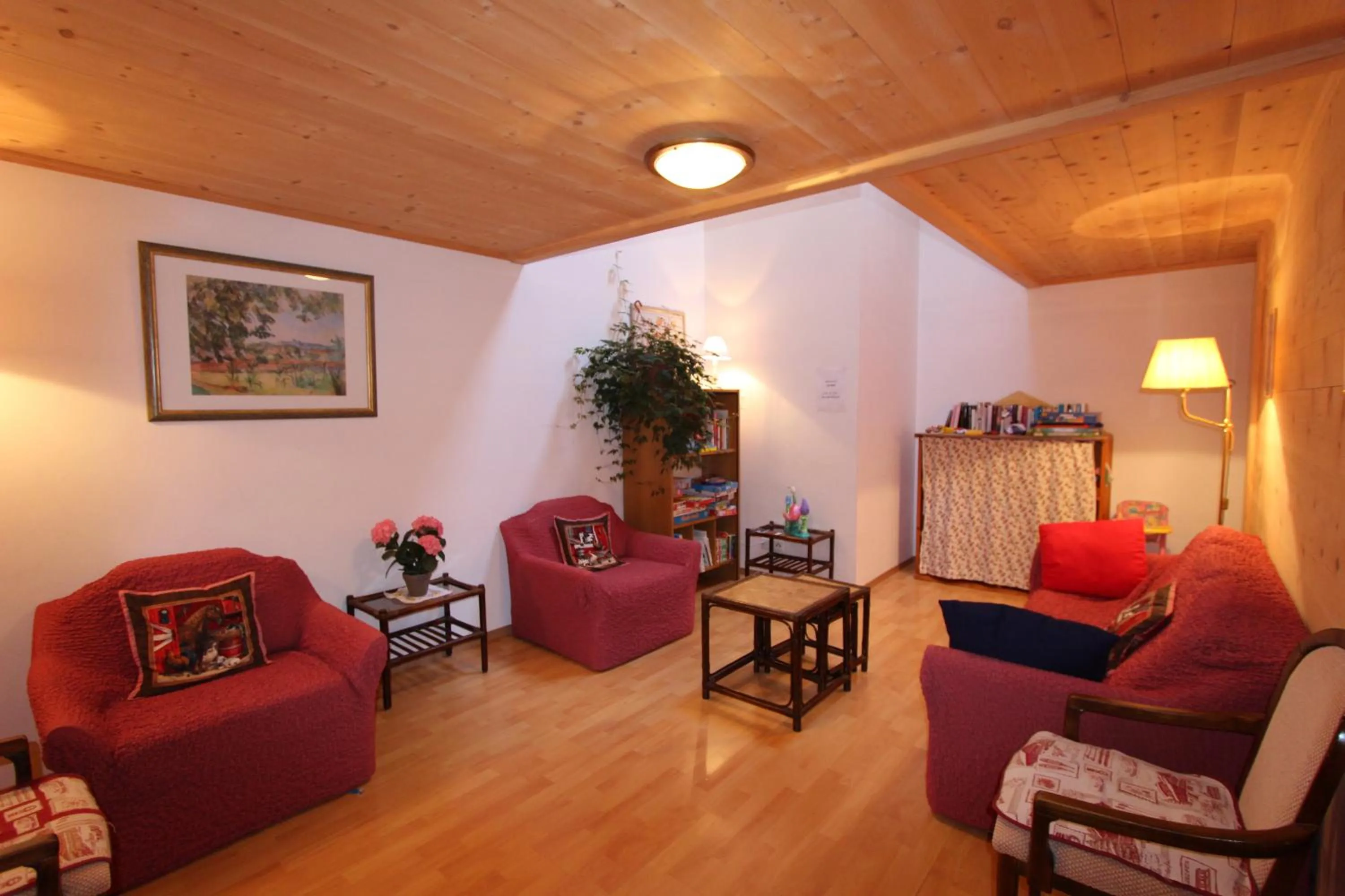 Communal lounge/ TV room in B&B Le Berceau