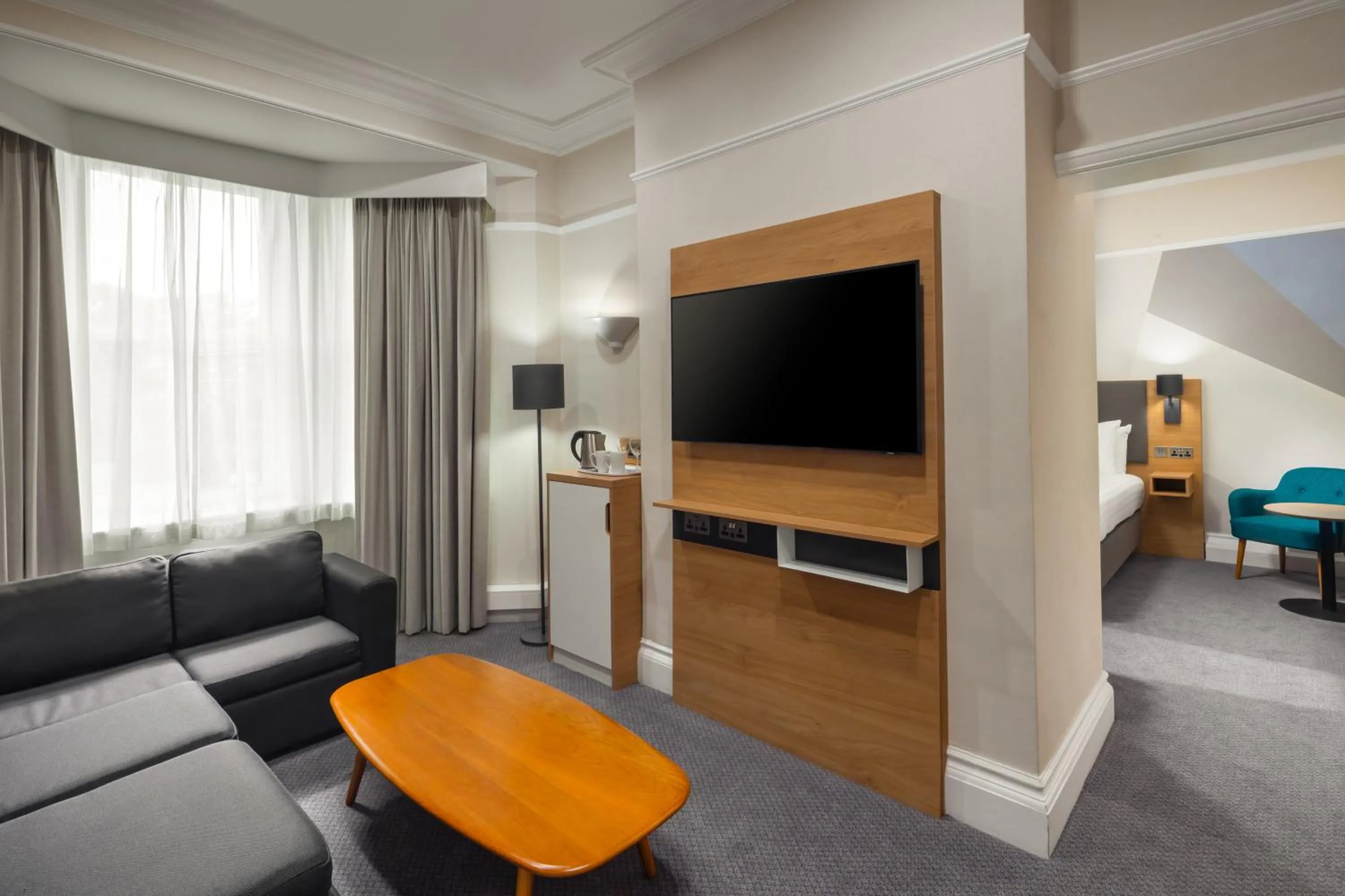 Seating area in Holiday Inn Farnborough by IHG