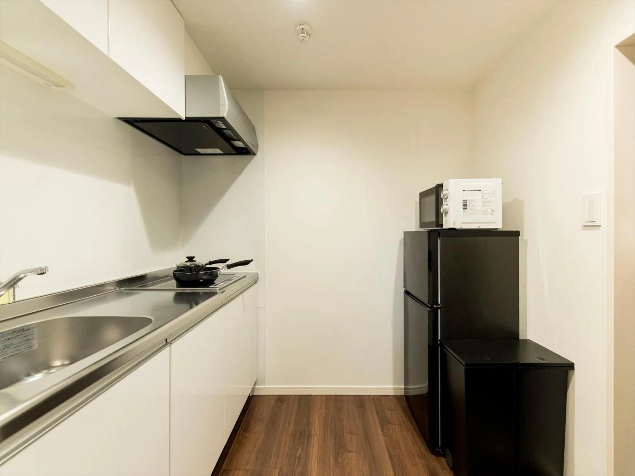 Kitchen or kitchenette in TRIP POD TAKASAGO A