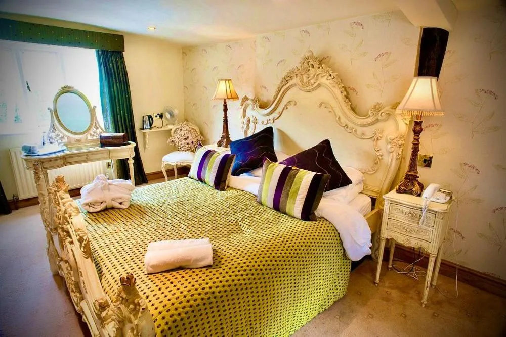 Bed in Angmering Manor Hotel