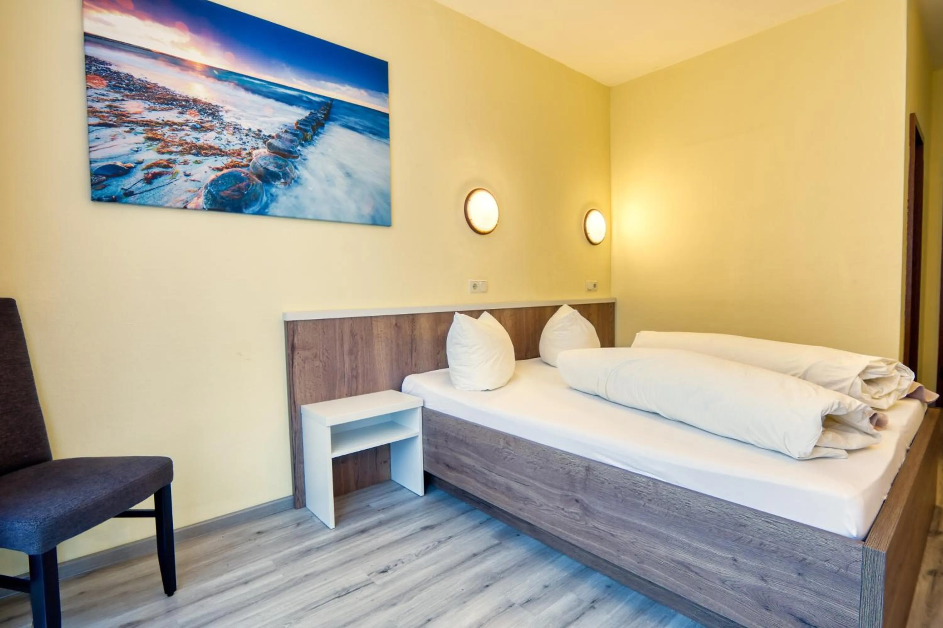 Bed in Hotel Kiebitz an der Ostsee