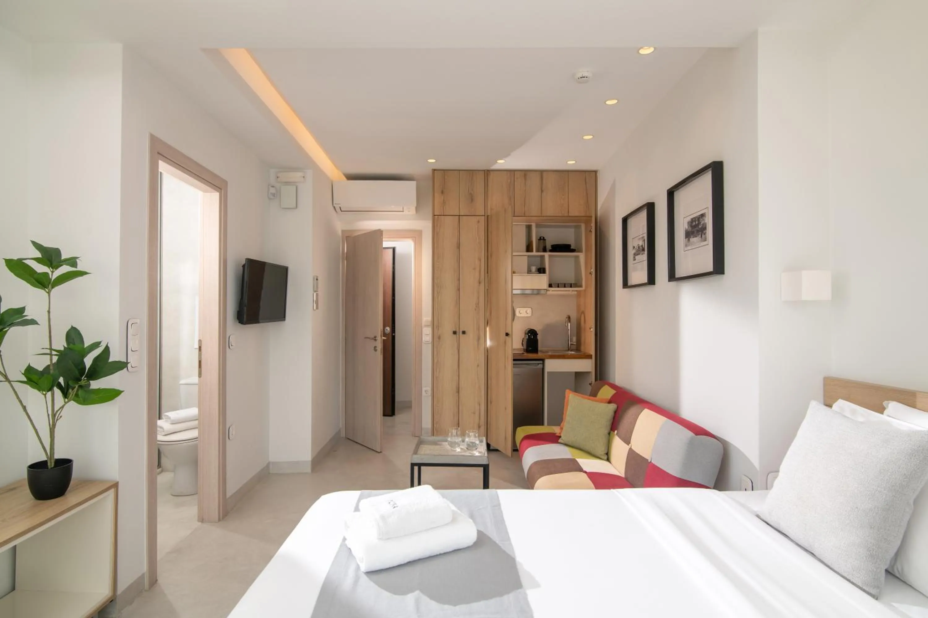 Bed in The Central Boutique Apartments