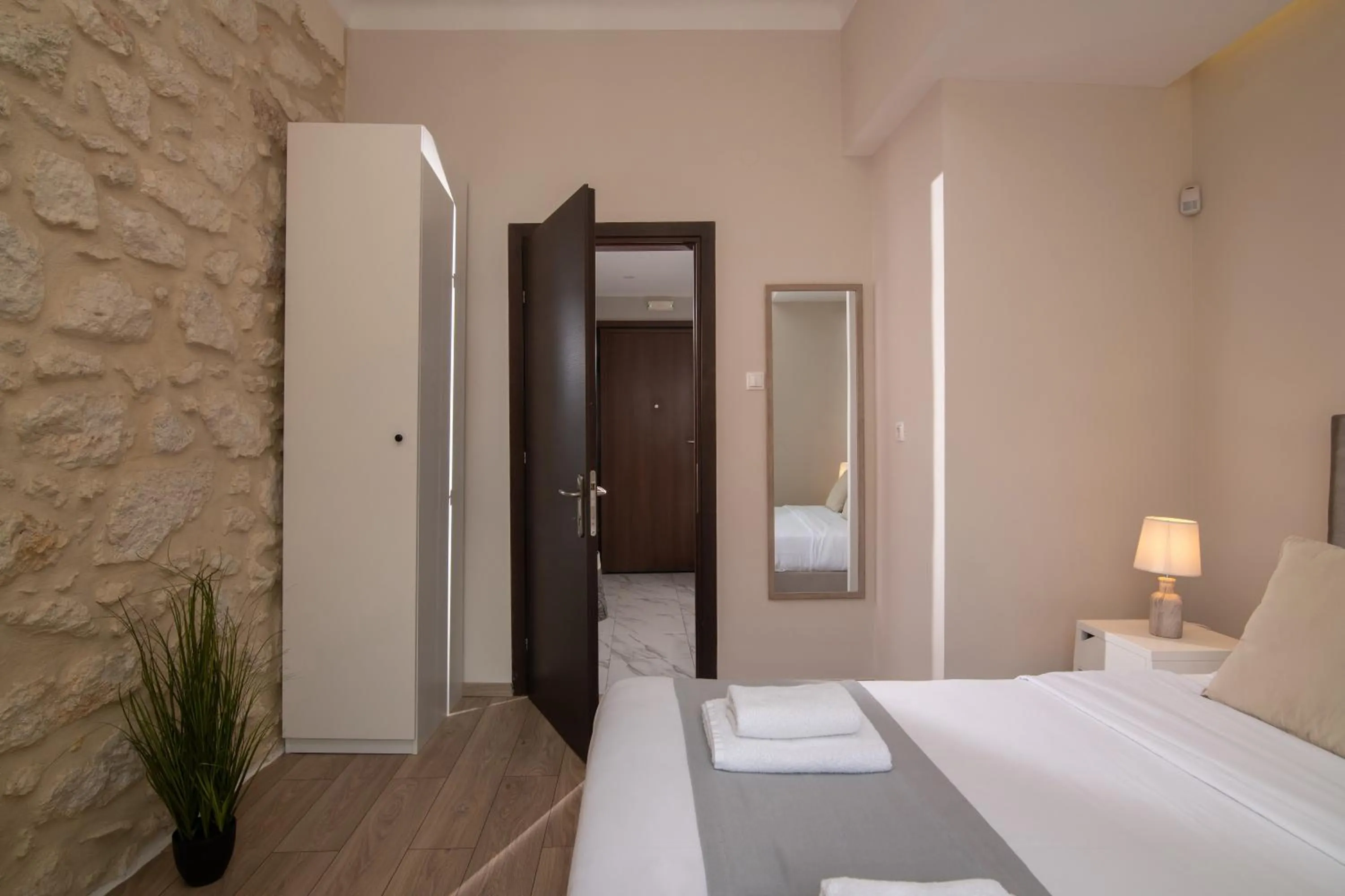 Bed in The Central Boutique Apartments