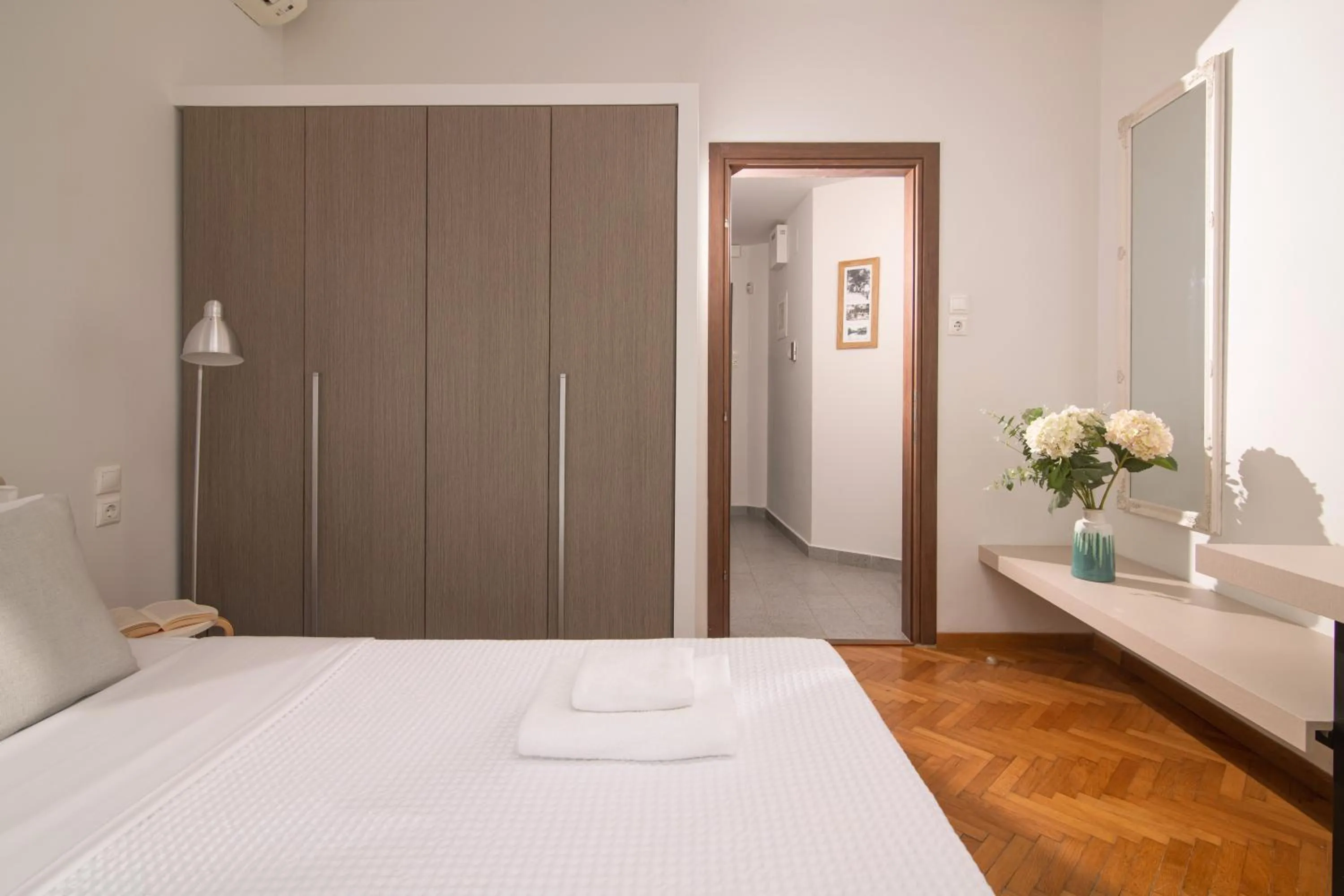 Bed in The Central Boutique Apartments