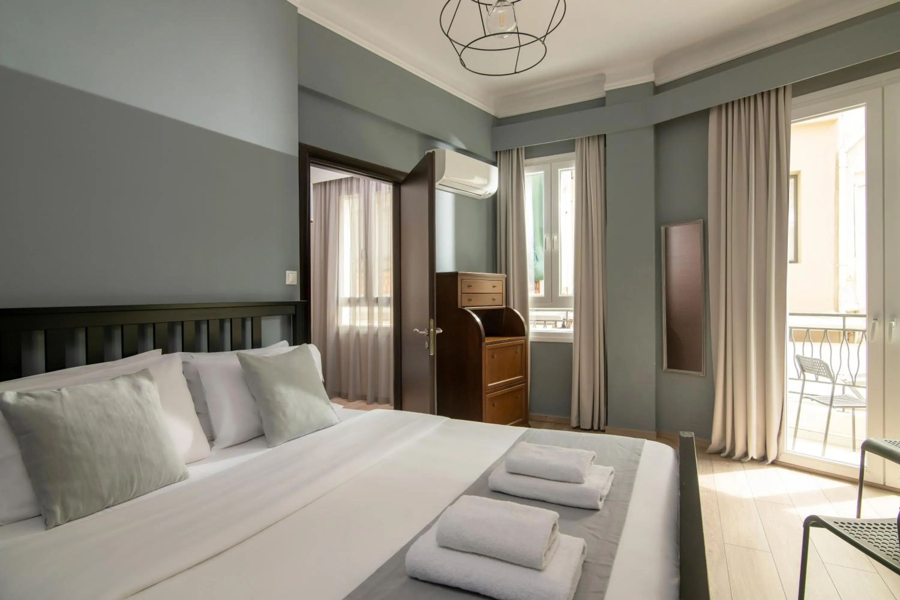 Bed in The Central Boutique Apartments