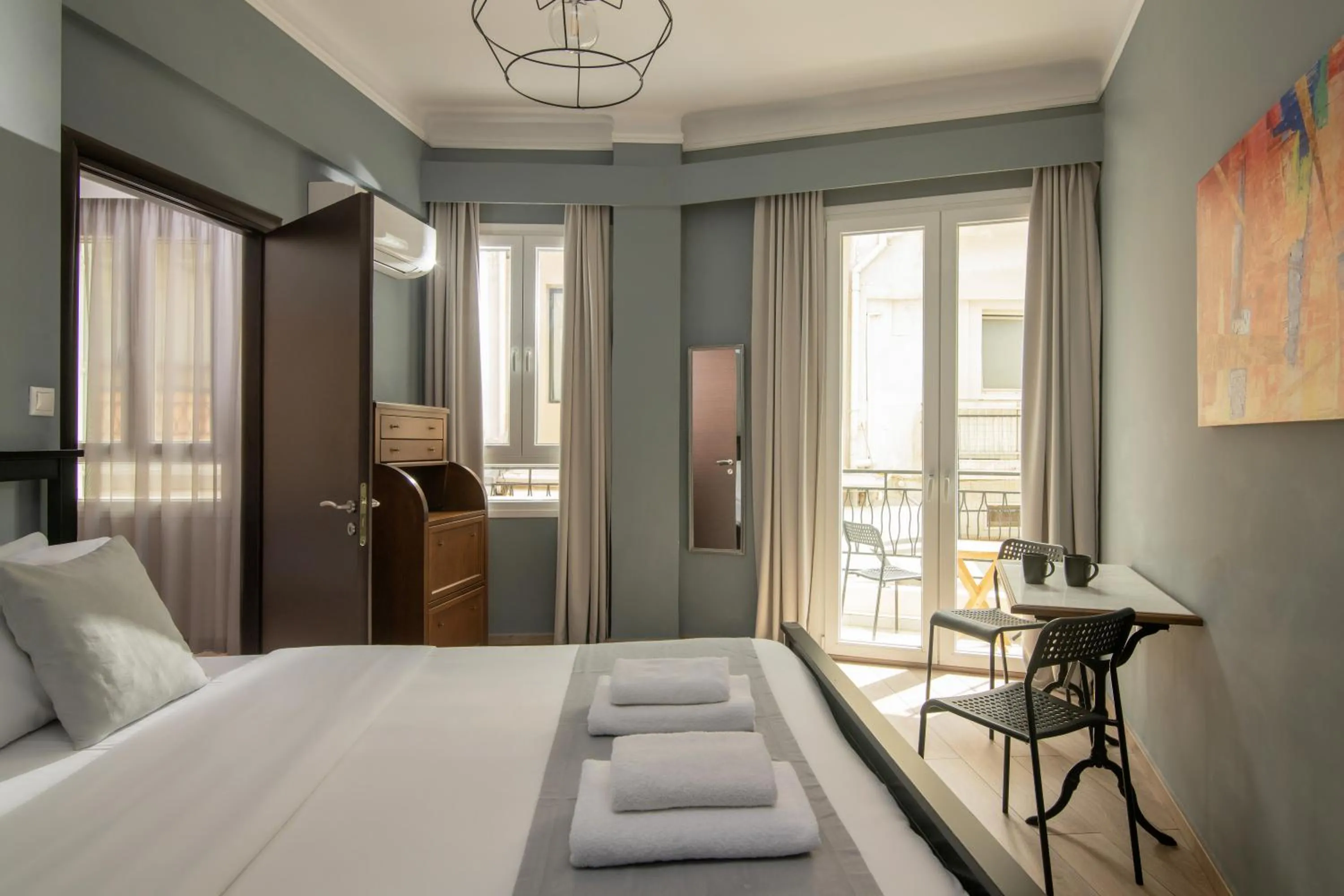 Bed in The Central Boutique Apartments