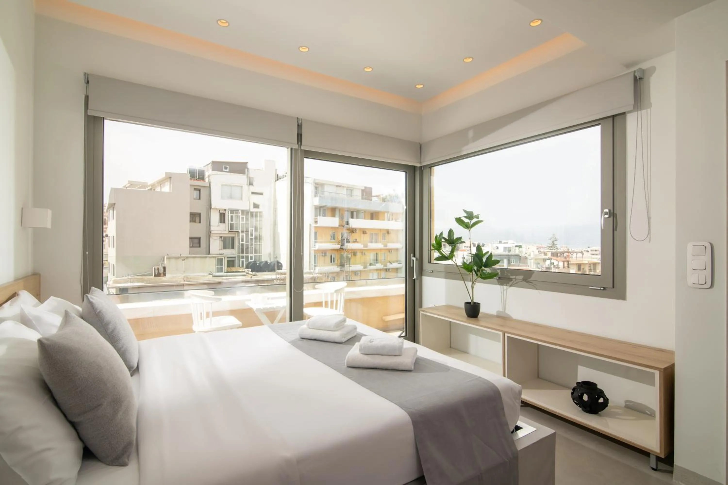 Bed in The Central Boutique Apartments
