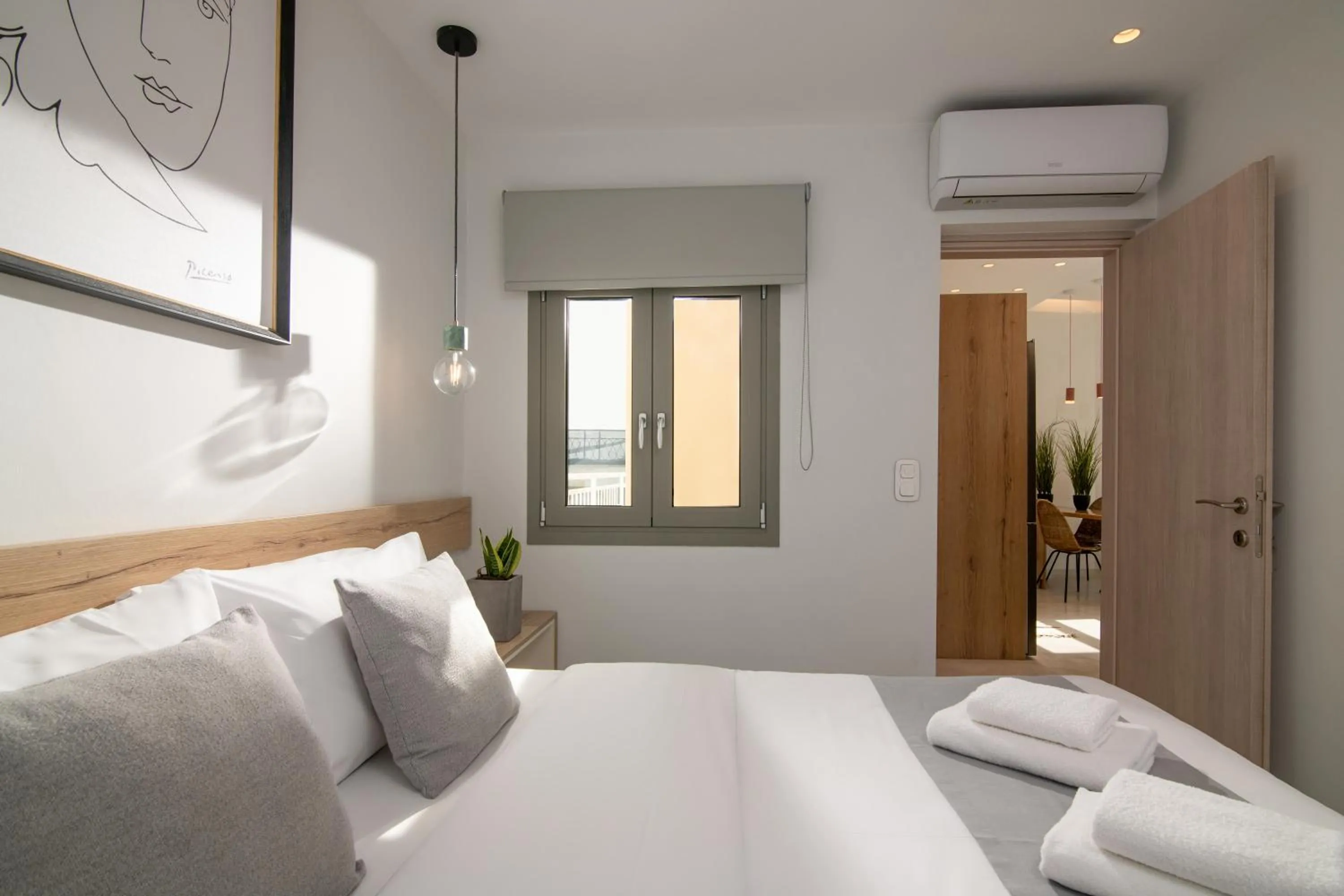 Bed in The Central Boutique Apartments
