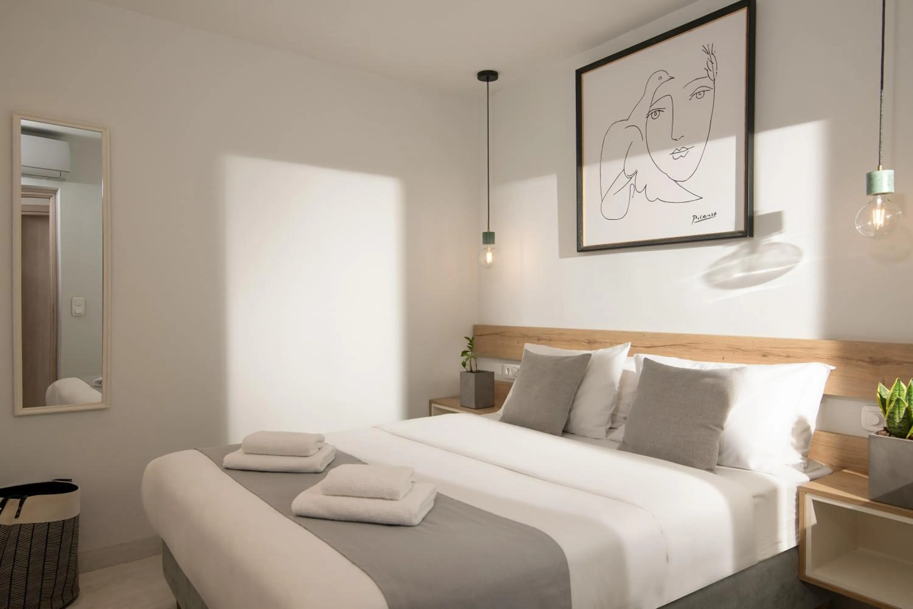 Bed in The Central Boutique Apartments