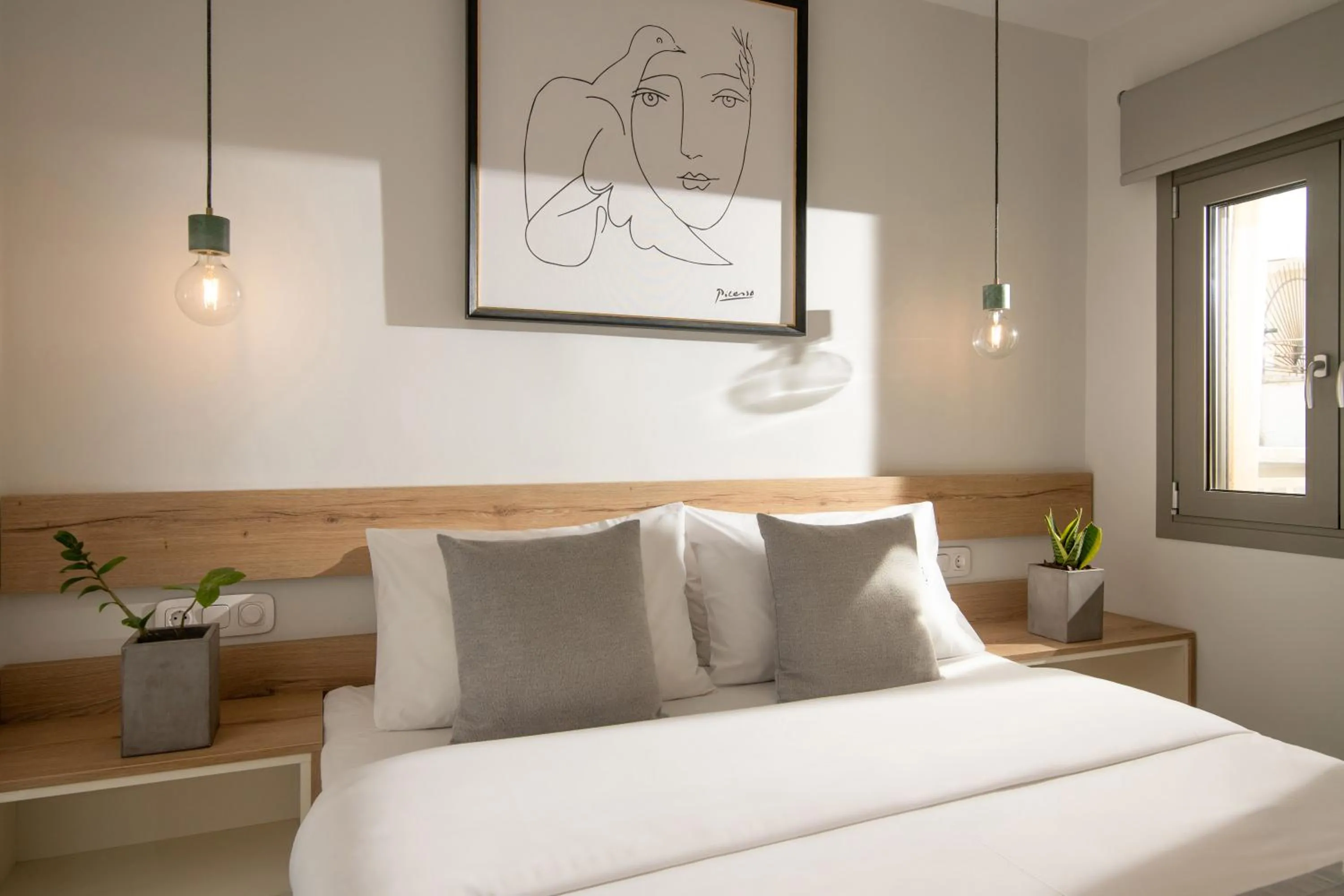 Bed in The Central Boutique Apartments