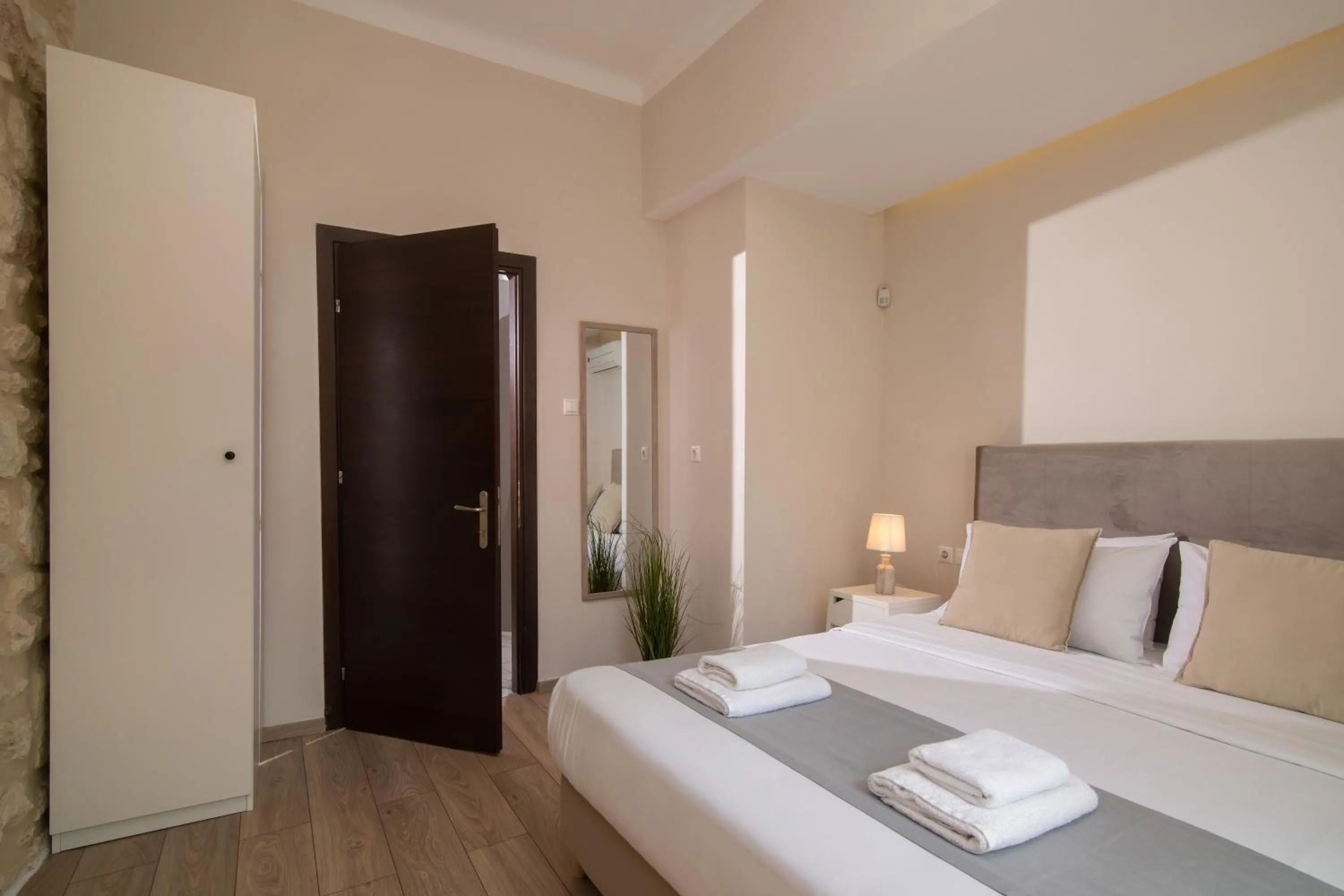 Bed in The Central Boutique Apartments