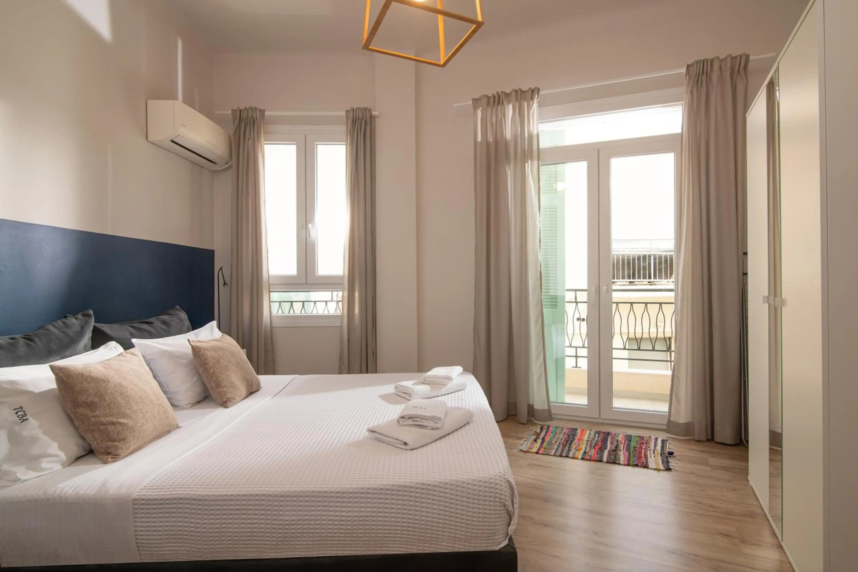 Bed in The Central Boutique Apartments