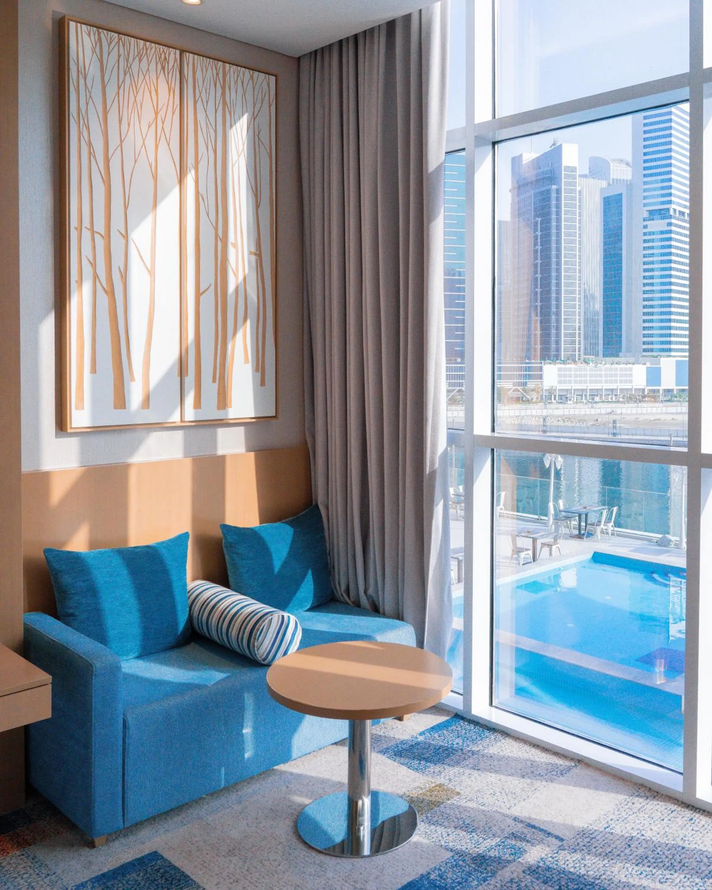 Seating area in Canal Central Hotel Business Bay