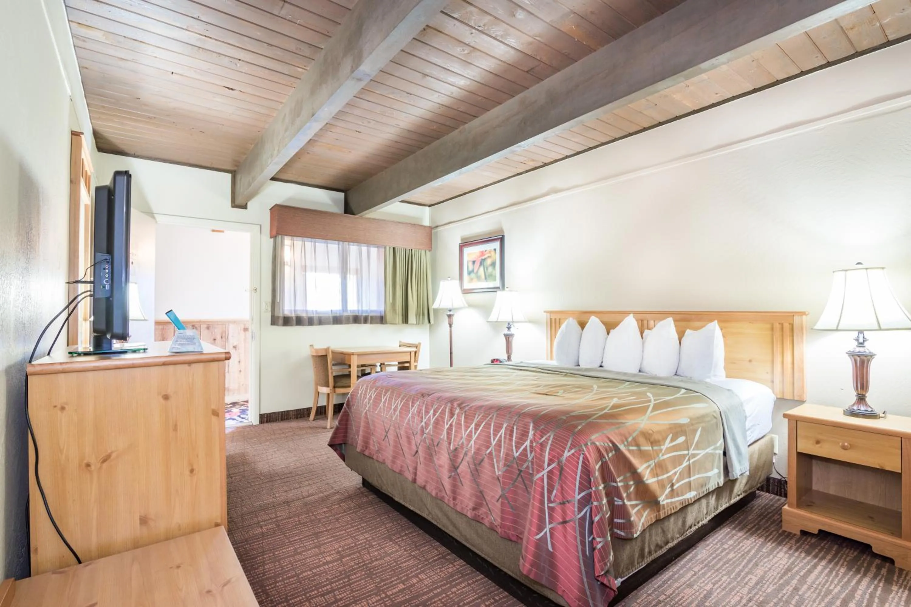 Bed in Teton West Motel