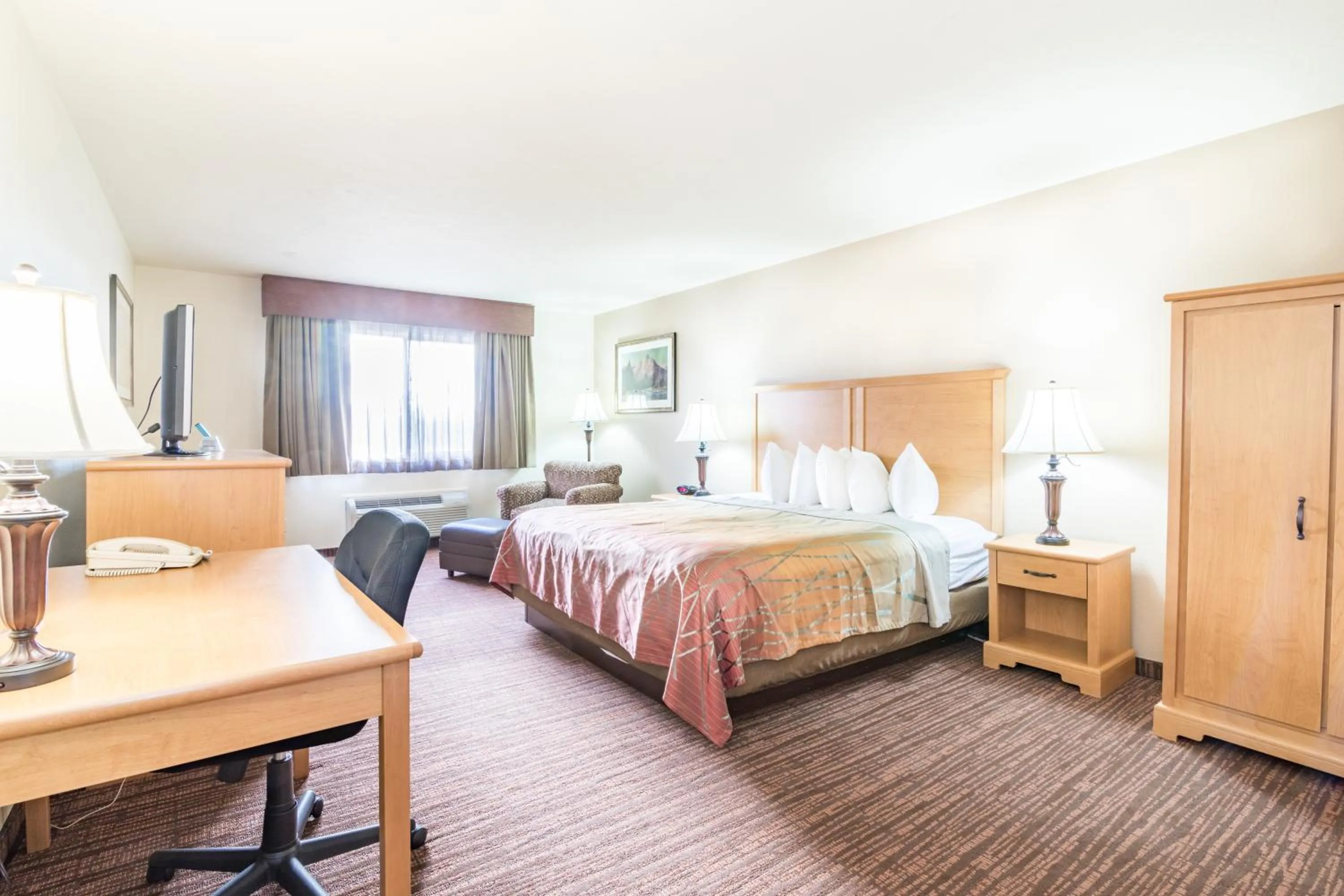 Bed in Teton West Motel