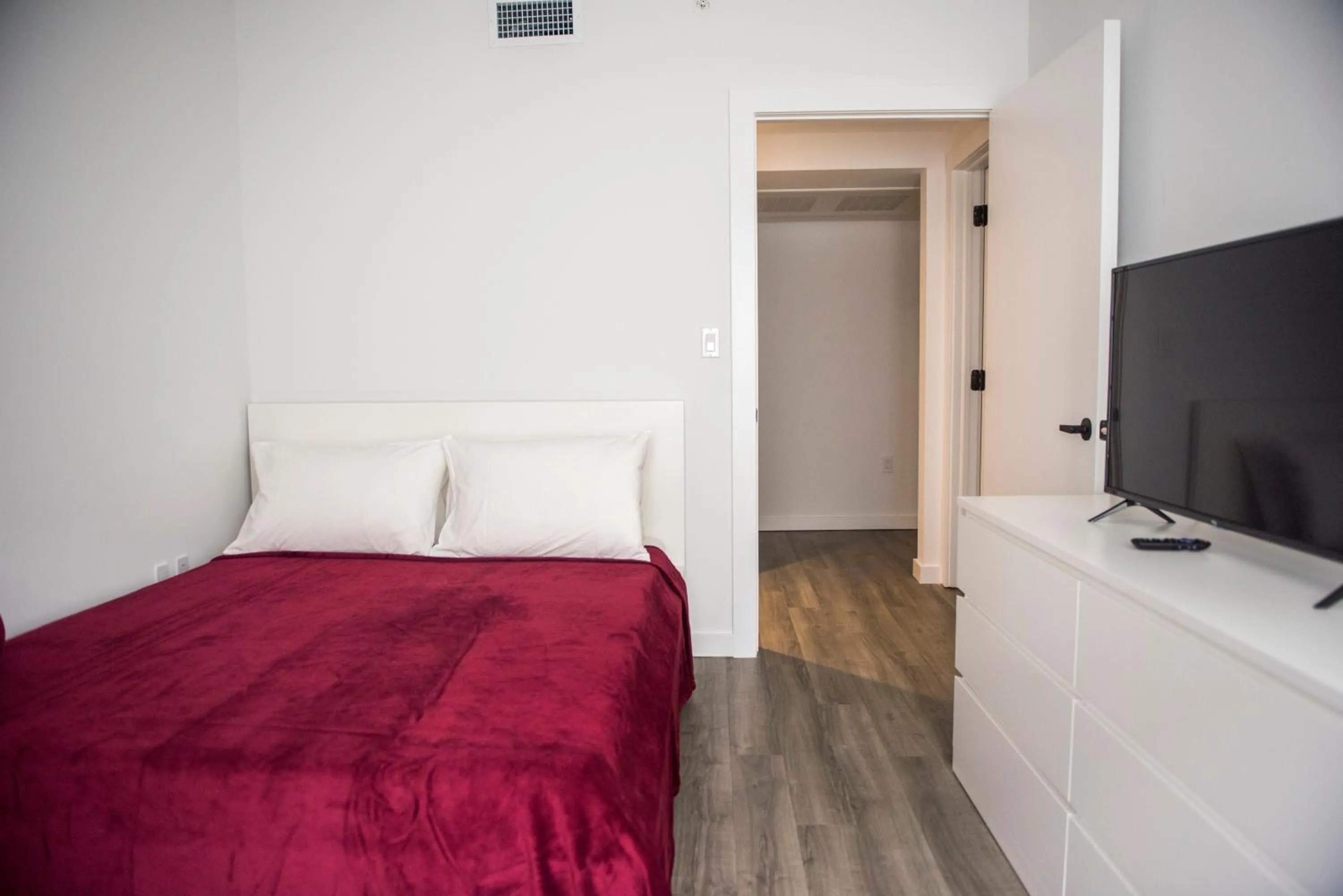 TV/Entertainment Center in 12th & Ocean Suites by LuxUrban