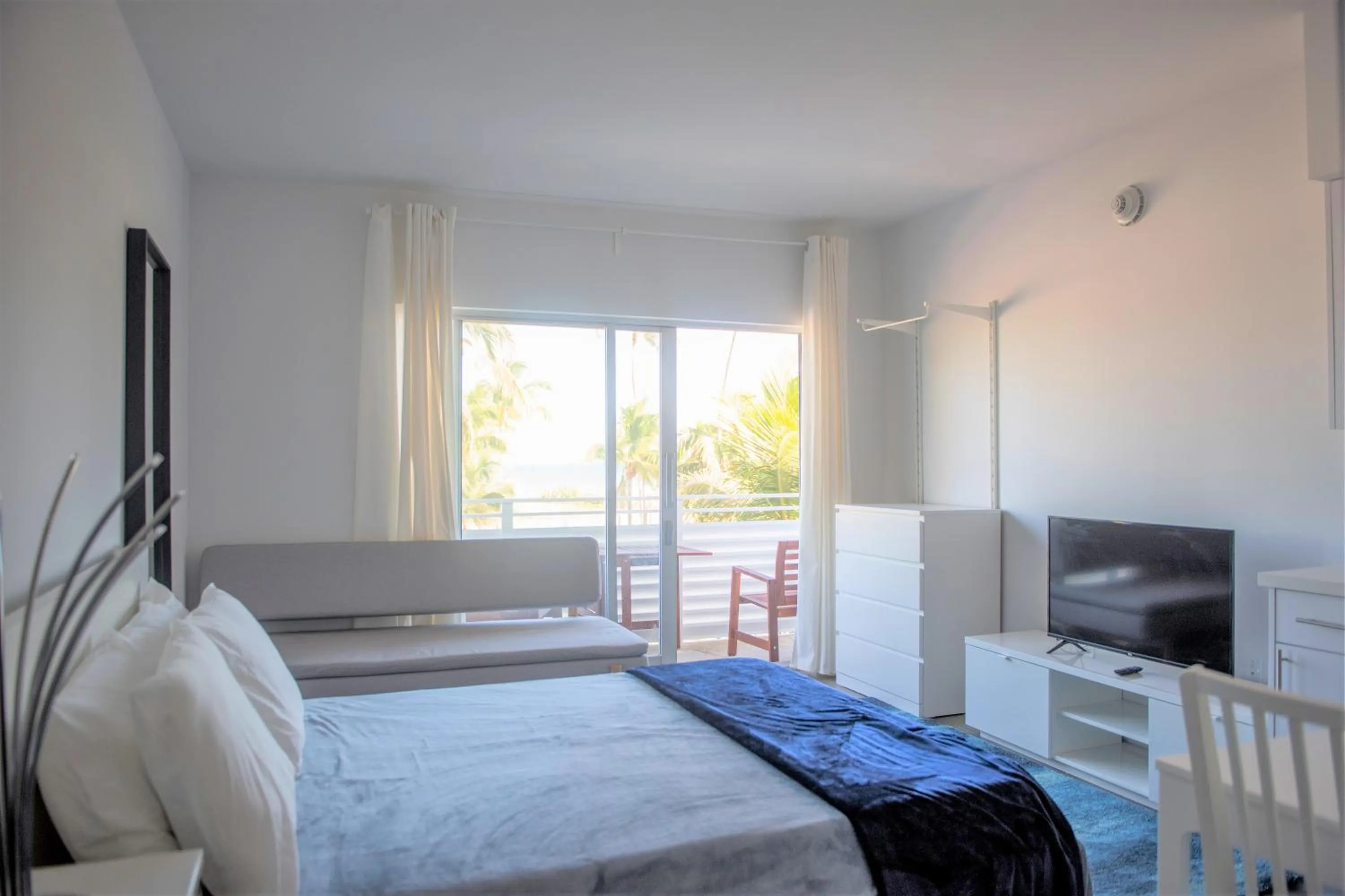 Bedroom in 12th & Ocean Suites by LuxUrban