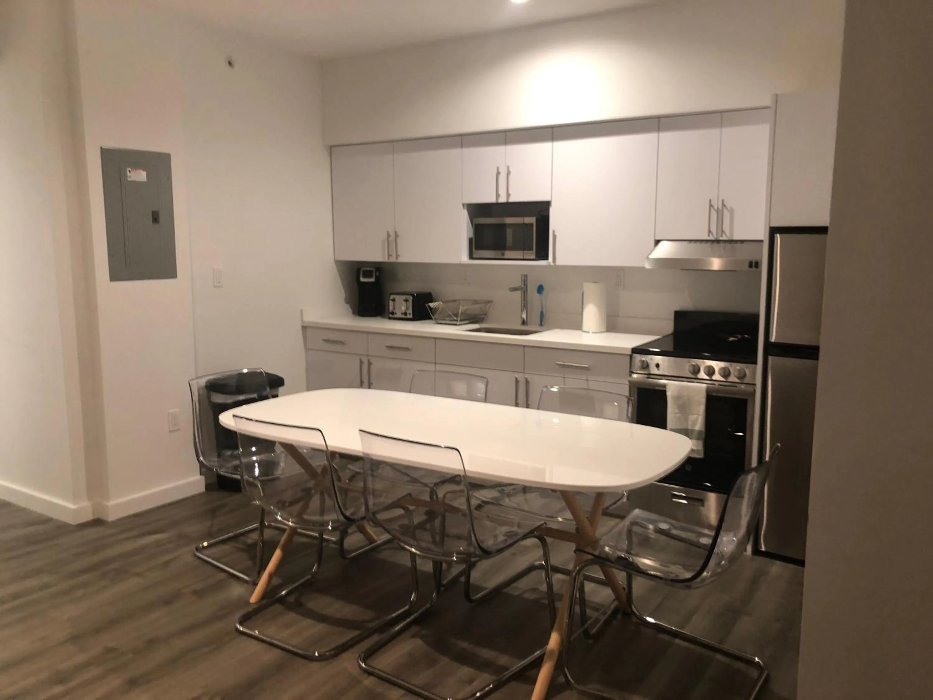 Kitchen/Kitchenette in 12th & Ocean Suites by LuxUrban
