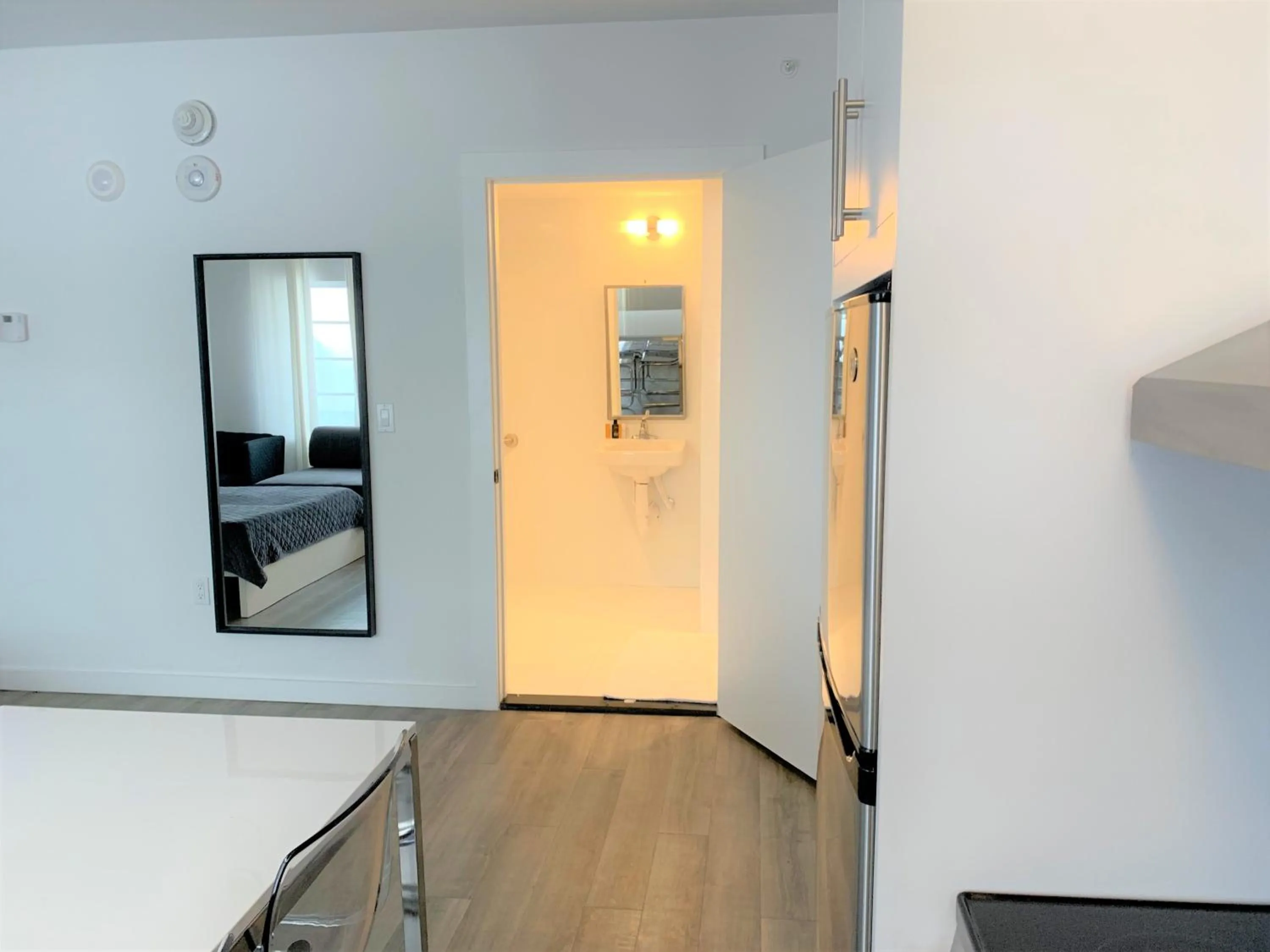 TV/Entertainment Center in 12th & Ocean Suites by LuxUrban