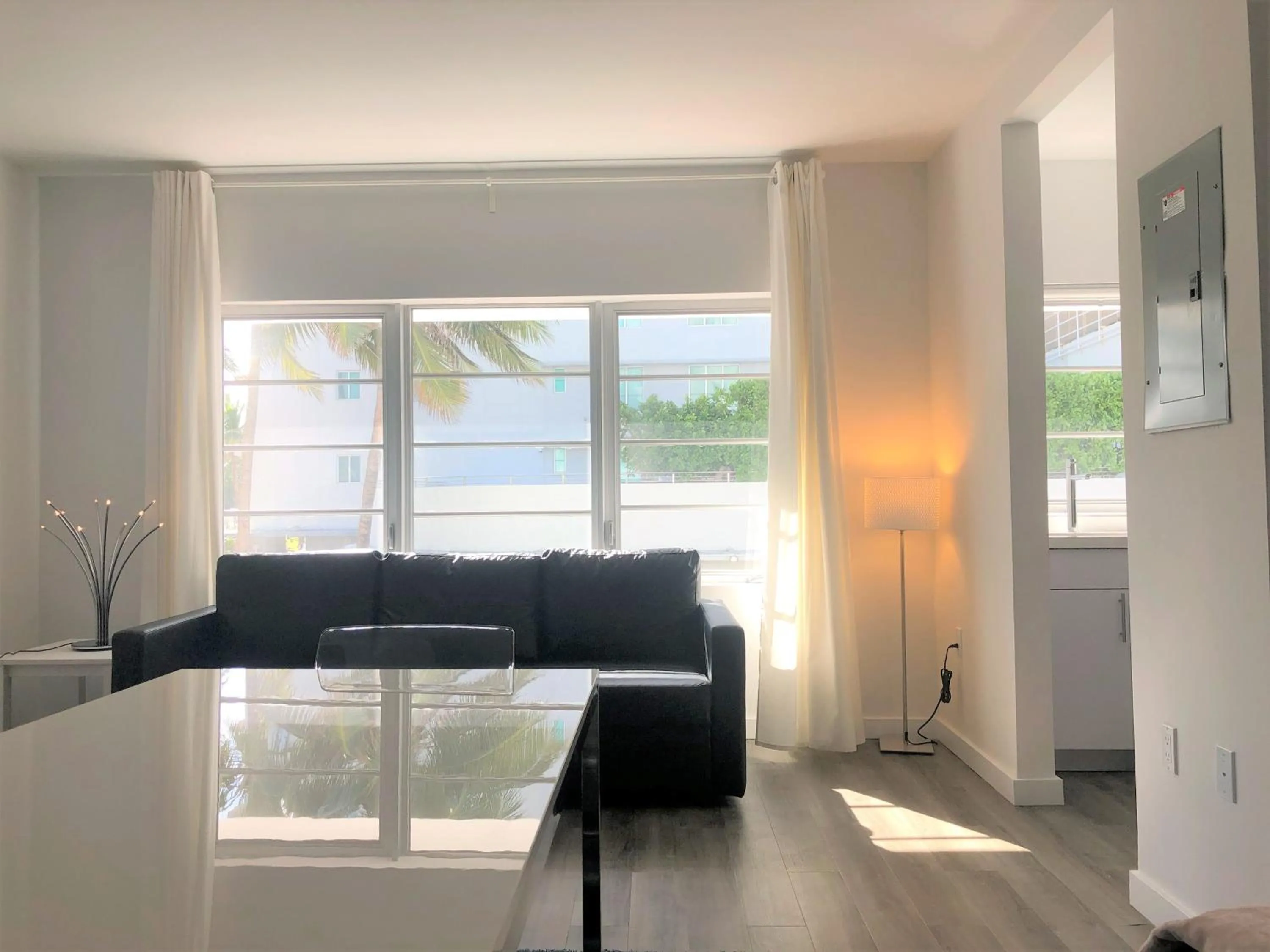 Seating Area in 12th & Ocean Suites by LuxUrban