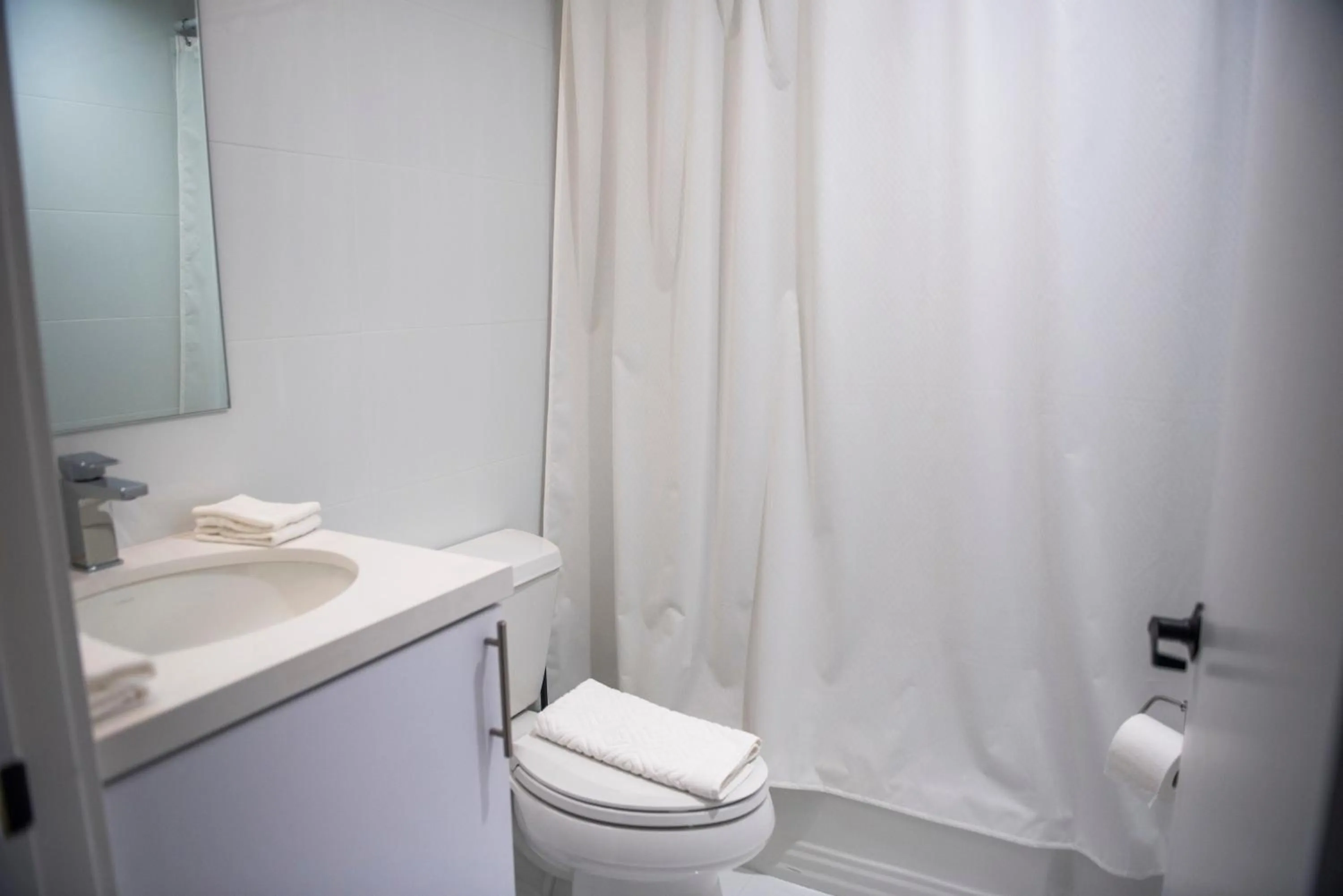 Bathroom in 12th & Ocean Suites by LuxUrban