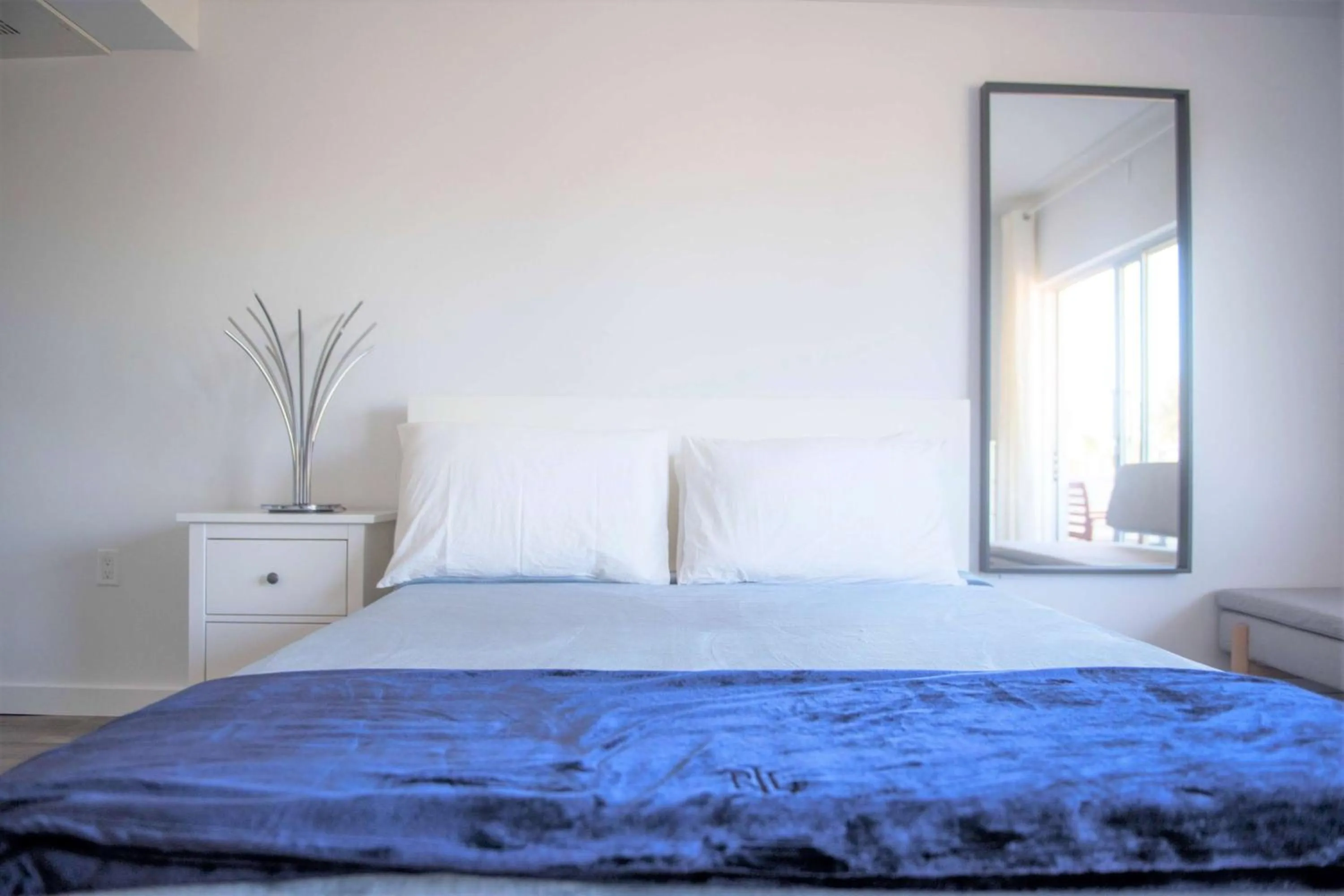 Photo of the whole room in 12th & Ocean Suites by LuxUrban