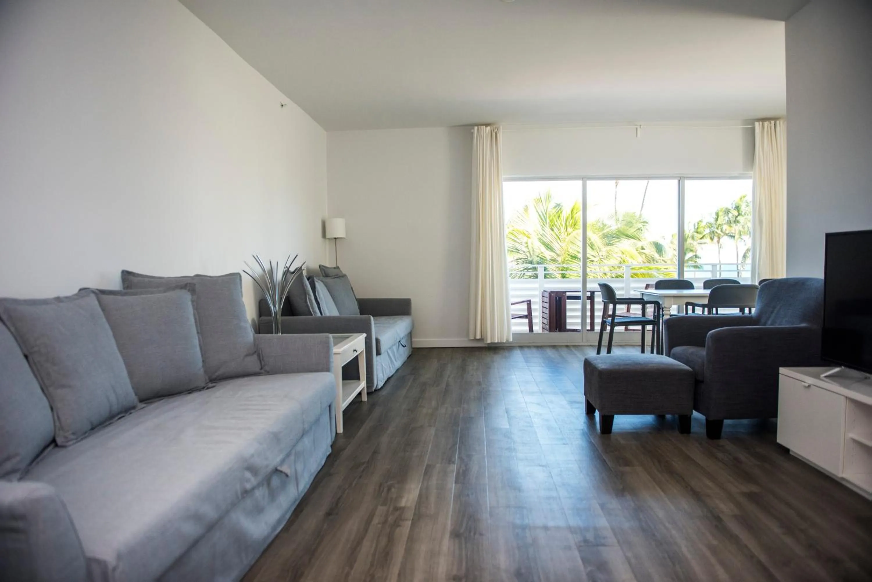 Seating Area in 12th & Ocean Suites by LuxUrban