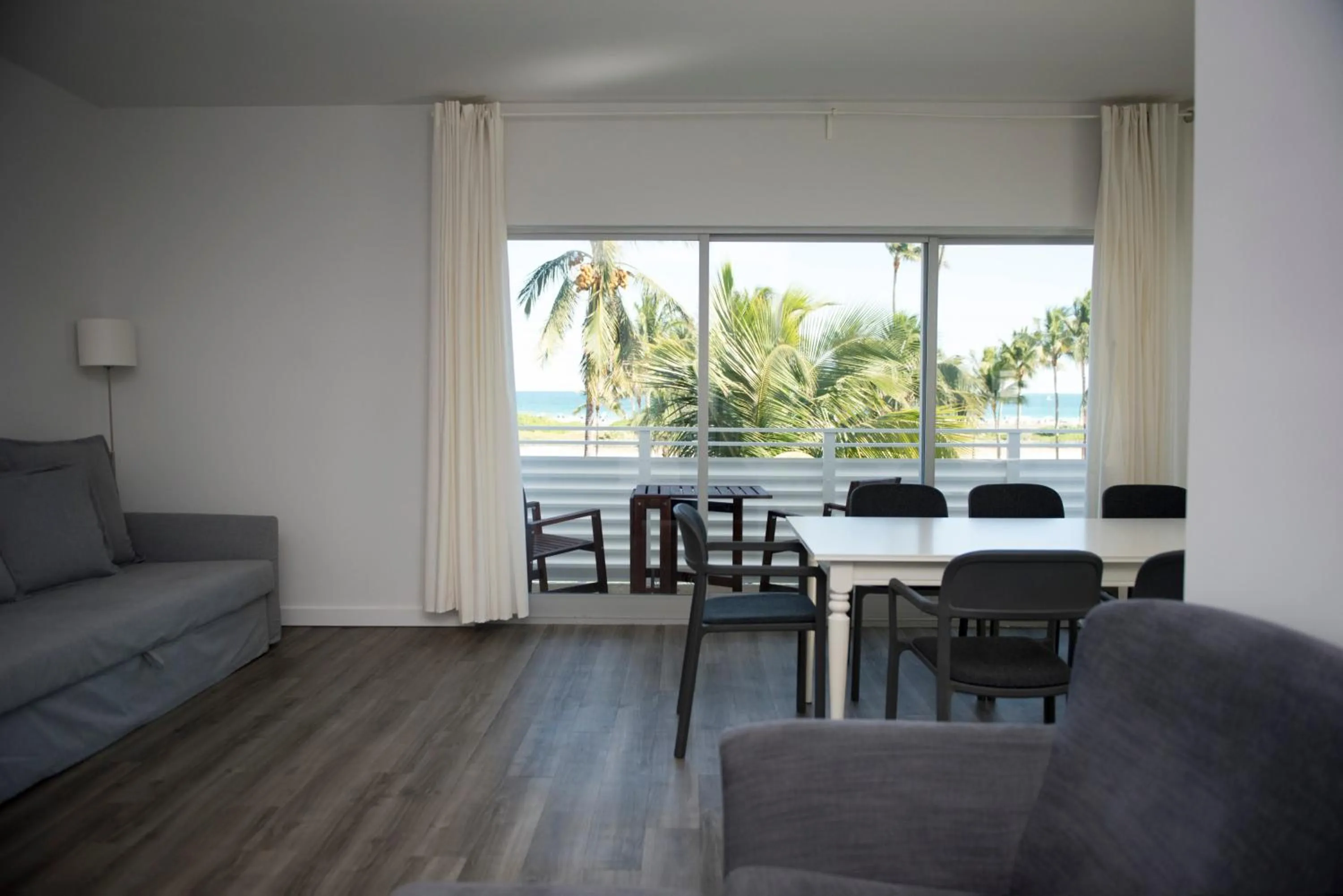 Seating Area in 12th & Ocean Suites by LuxUrban