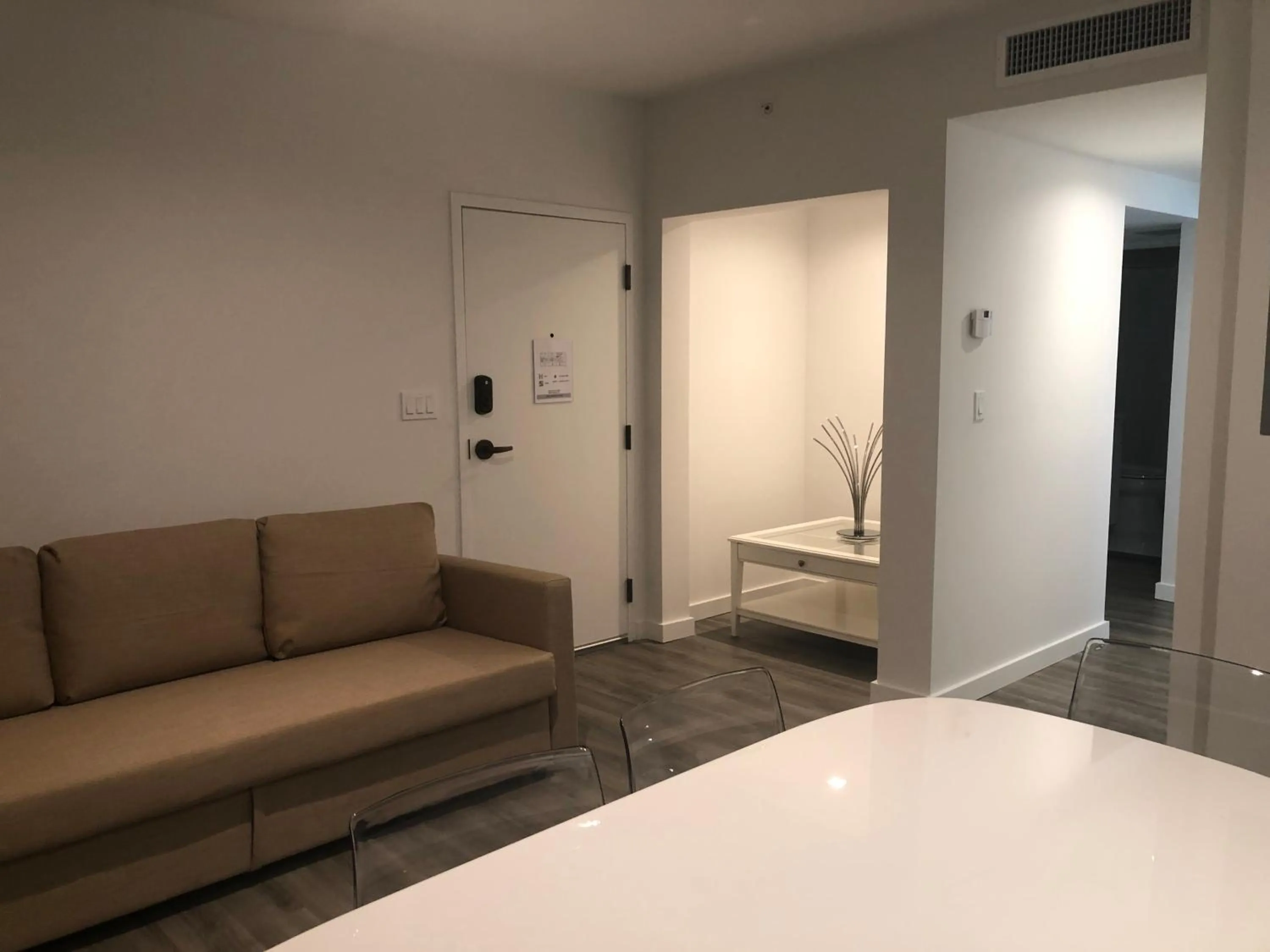 Seating Area in 12th & Ocean Suites by LuxUrban