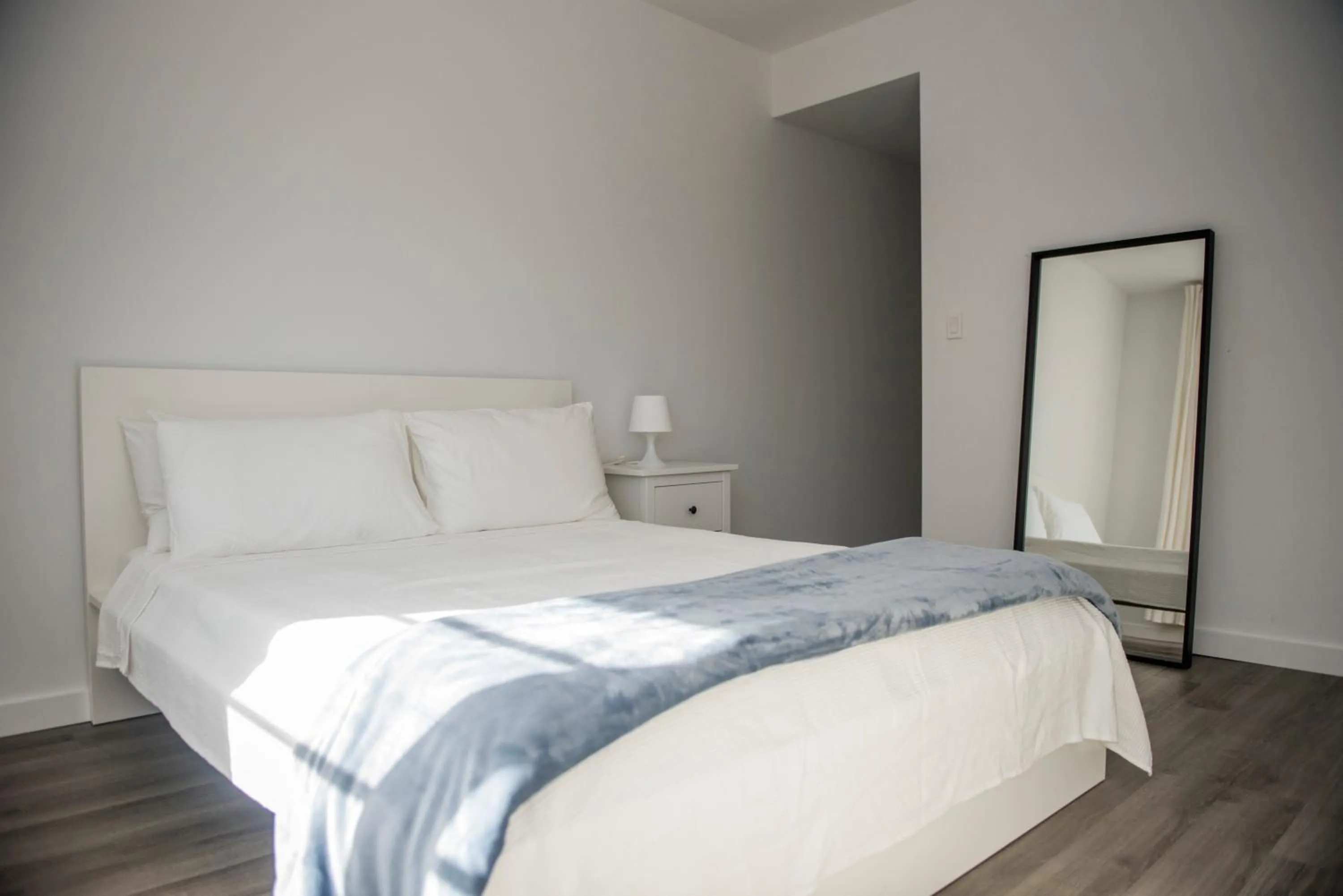 Bedroom in 12th & Ocean Suites by LuxUrban