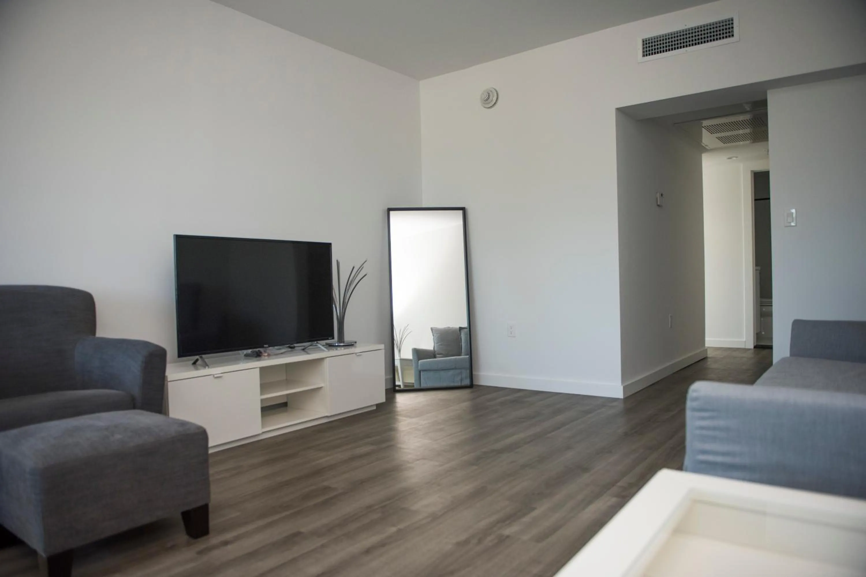 TV/Entertainment Center in 12th & Ocean Suites by LuxUrban