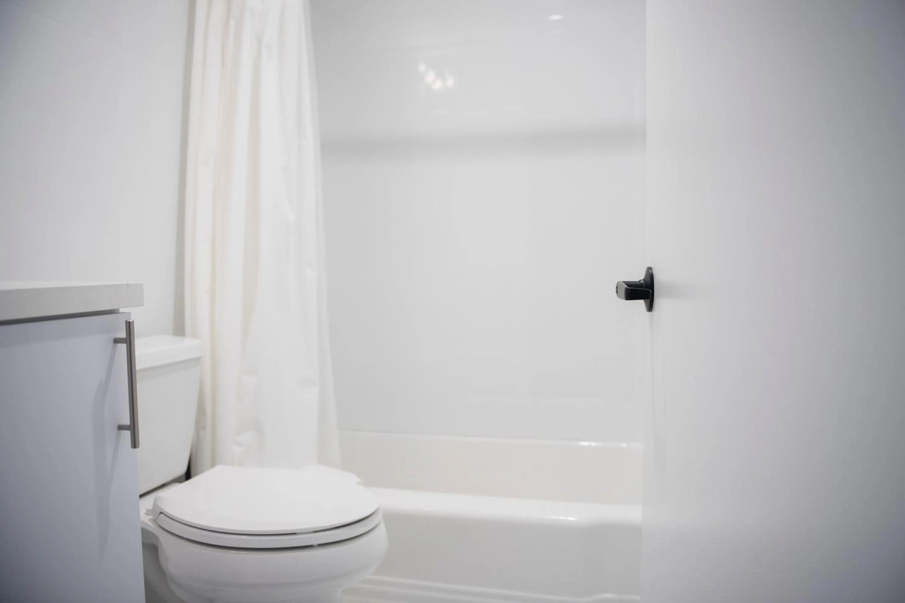 Bathroom in 12th & Ocean Suites by LuxUrban