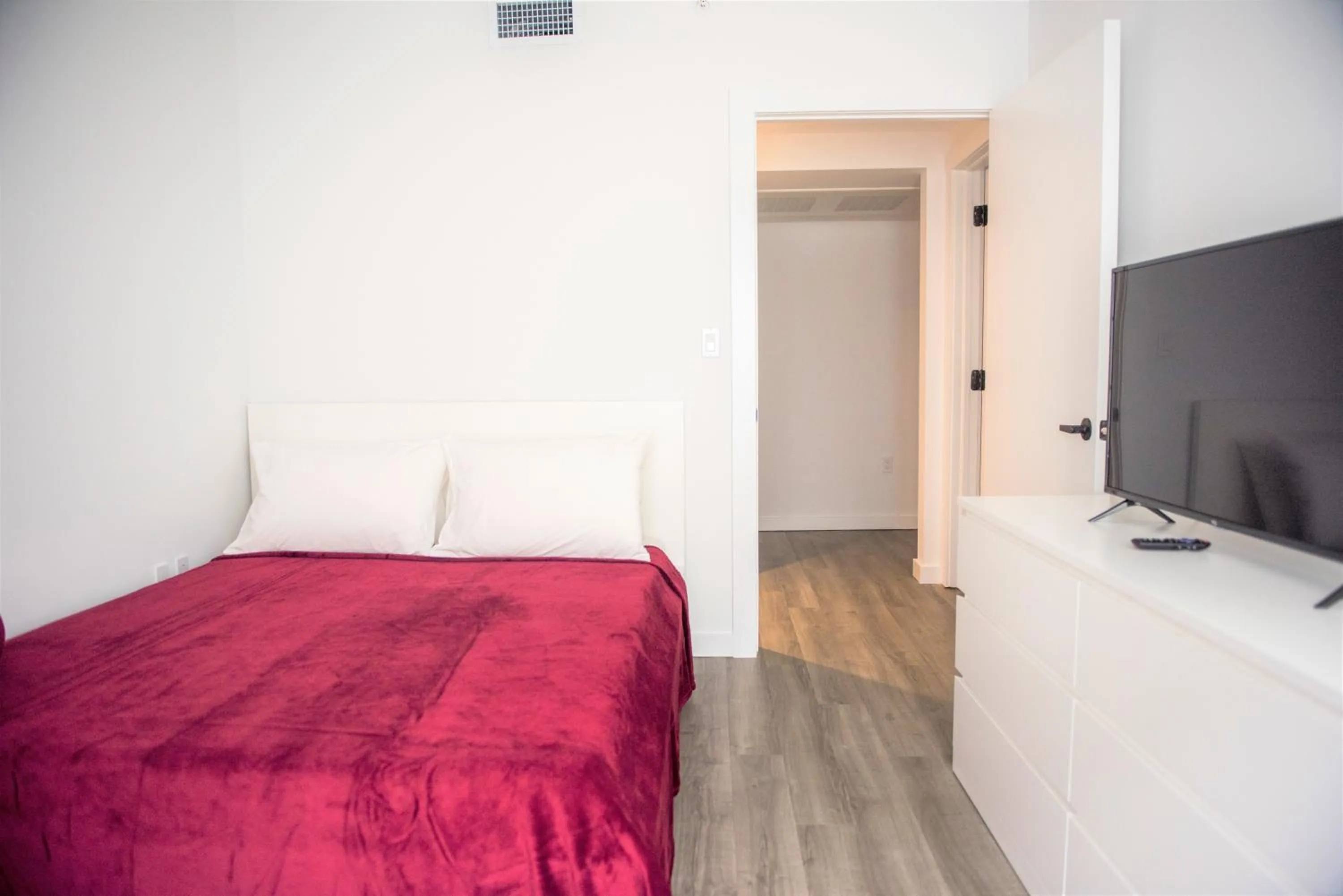 TV/Entertainment Center in 12th & Ocean Suites by LuxUrban