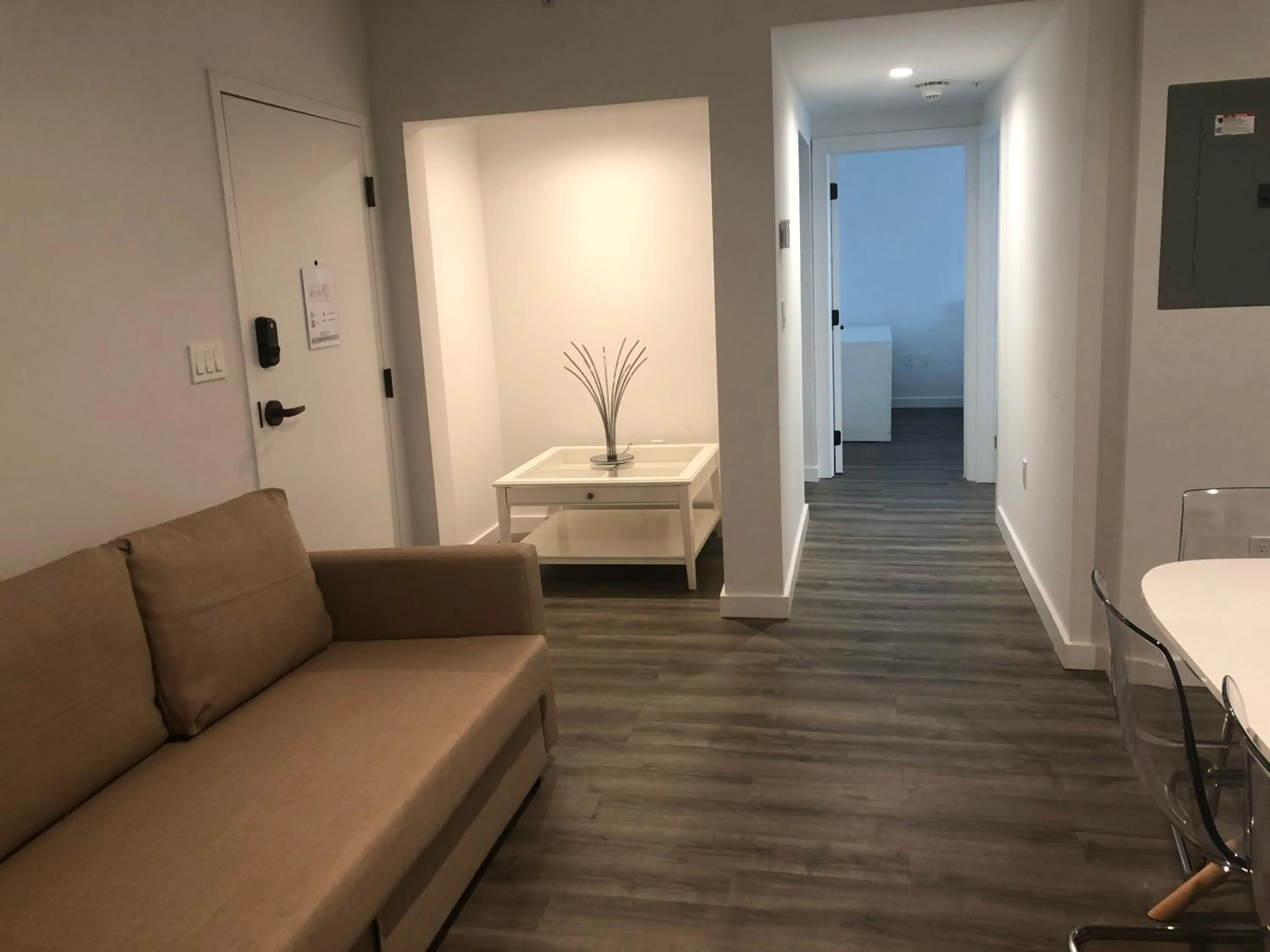 Seating Area in 12th & Ocean Suites by LuxUrban