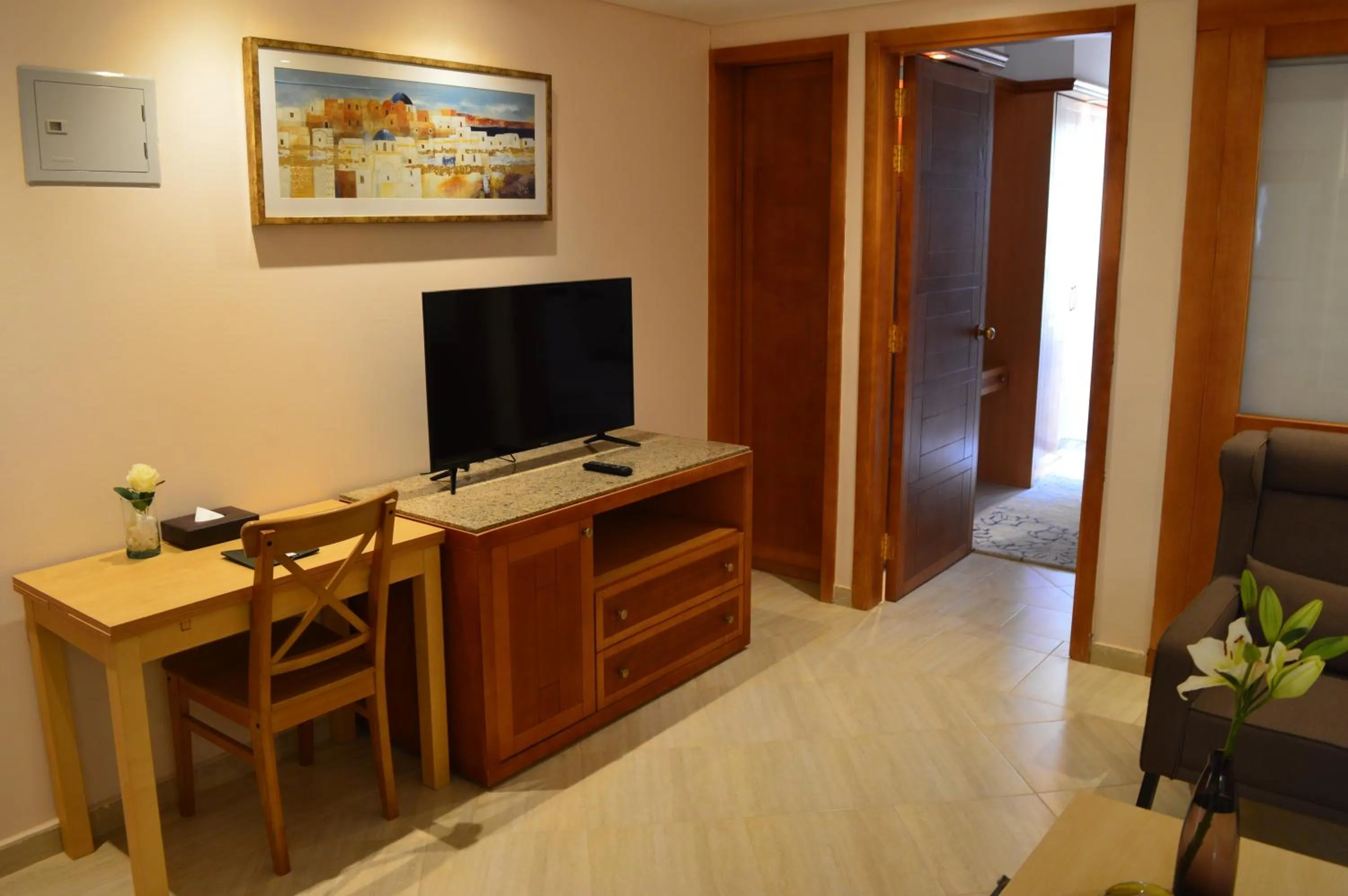 TV and multimedia in Sky View Suites Hotel