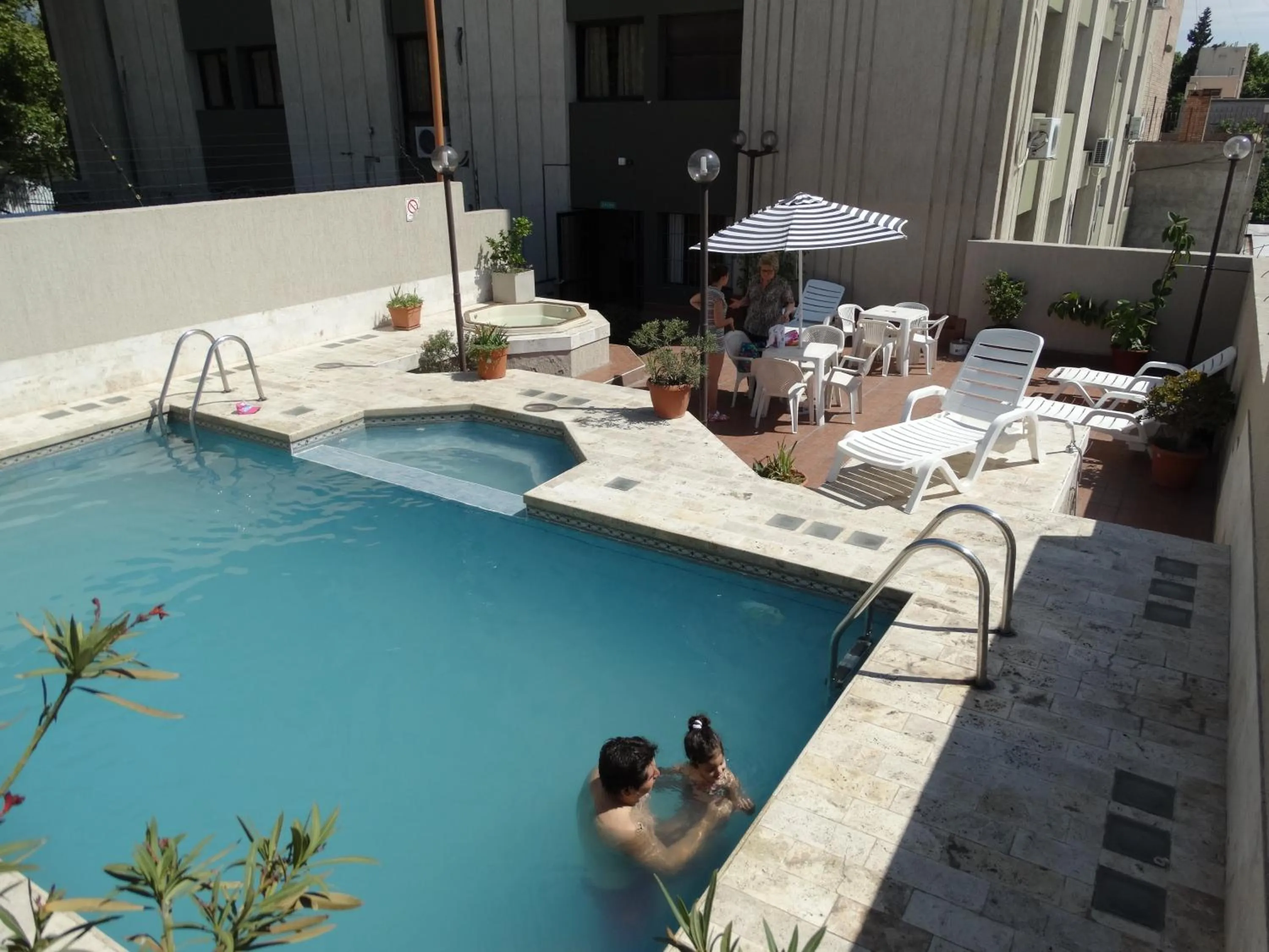 Swimming pool in Altezza Apart Suites