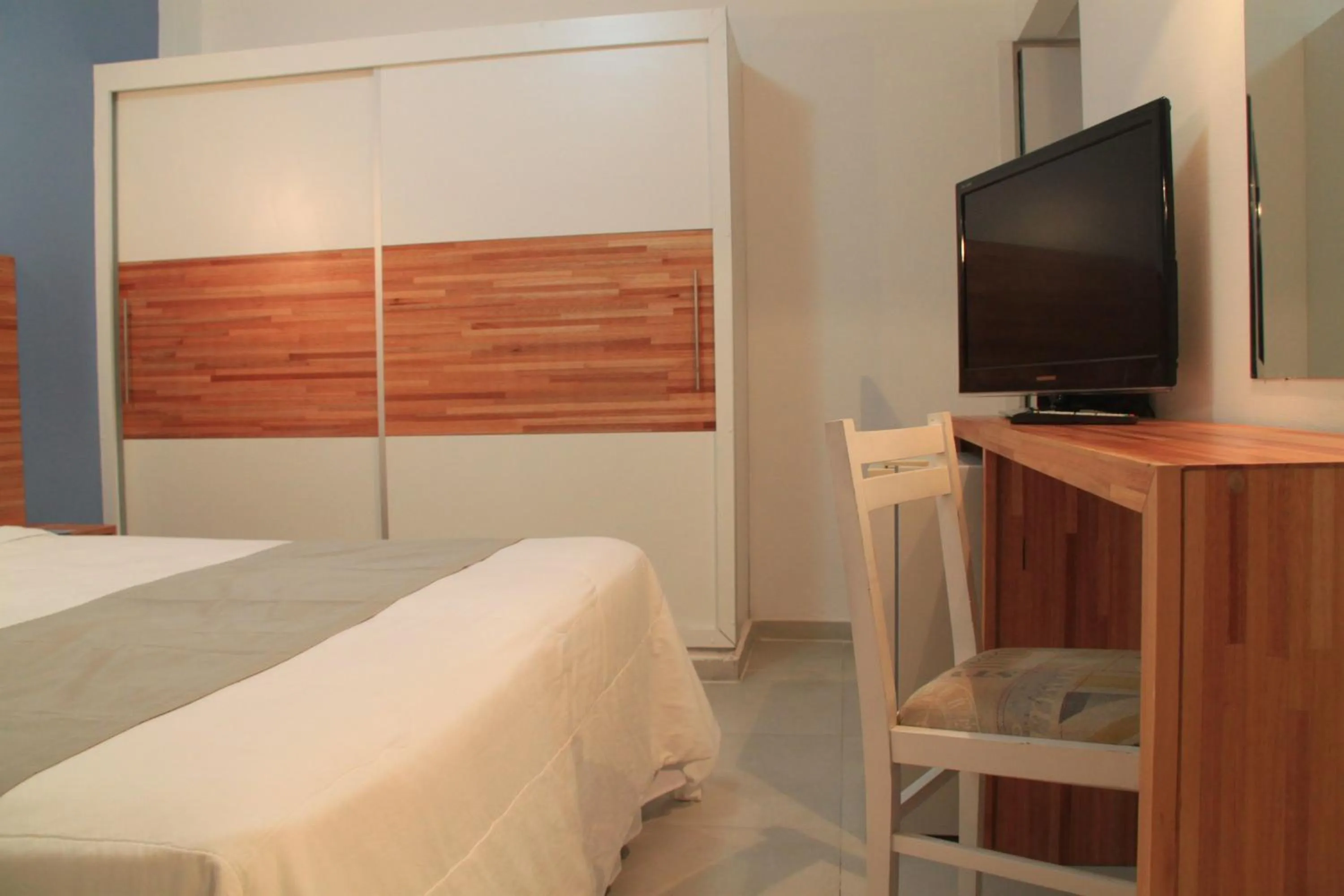 Seating area, Bed in Hotel Florinda