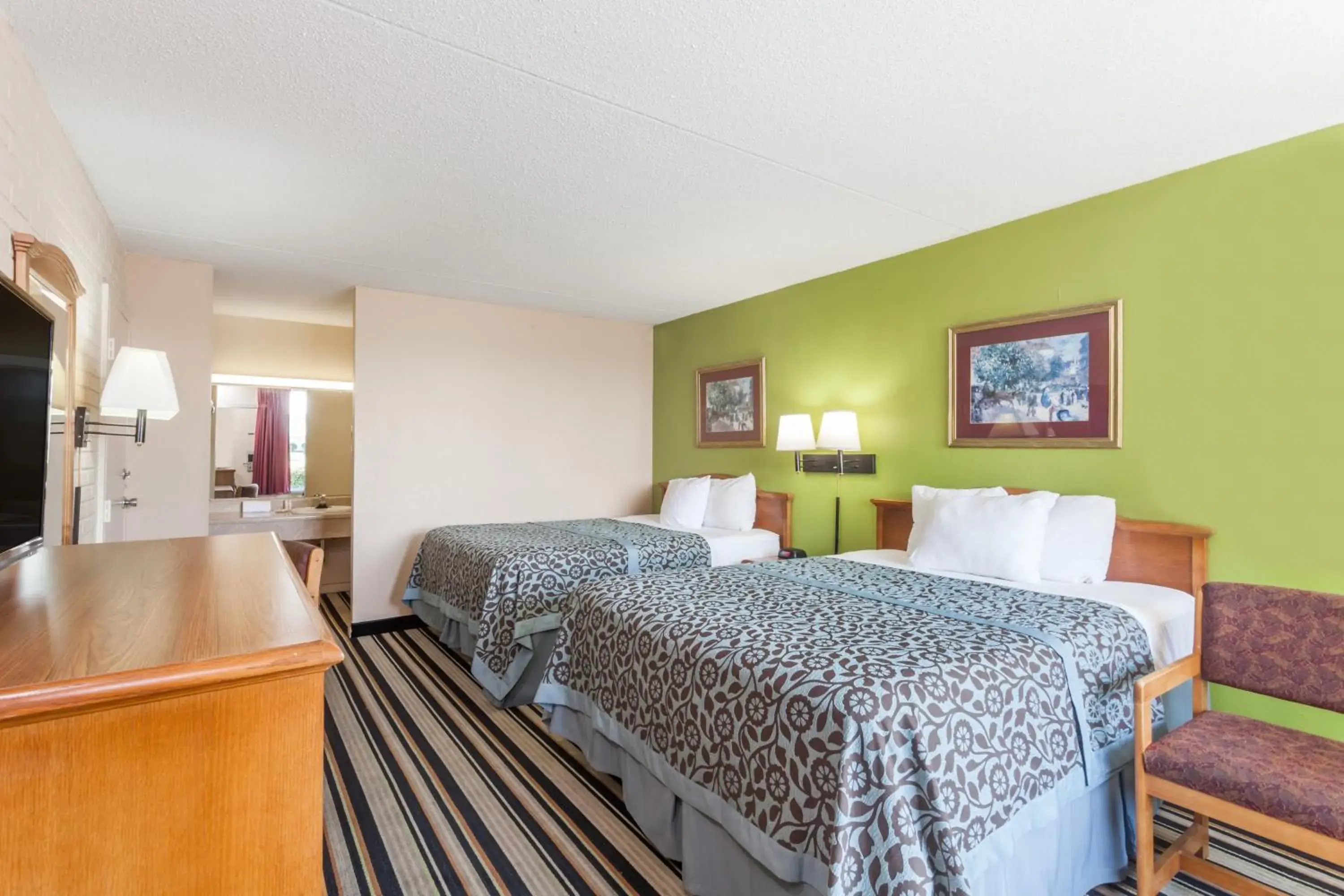 Queen Room with Two Queen Beds Smoking in Days Inn by Wyndham Jackson Queen Room with Two Queen Beds Smoking in Days Inn by Wyndham Jackson