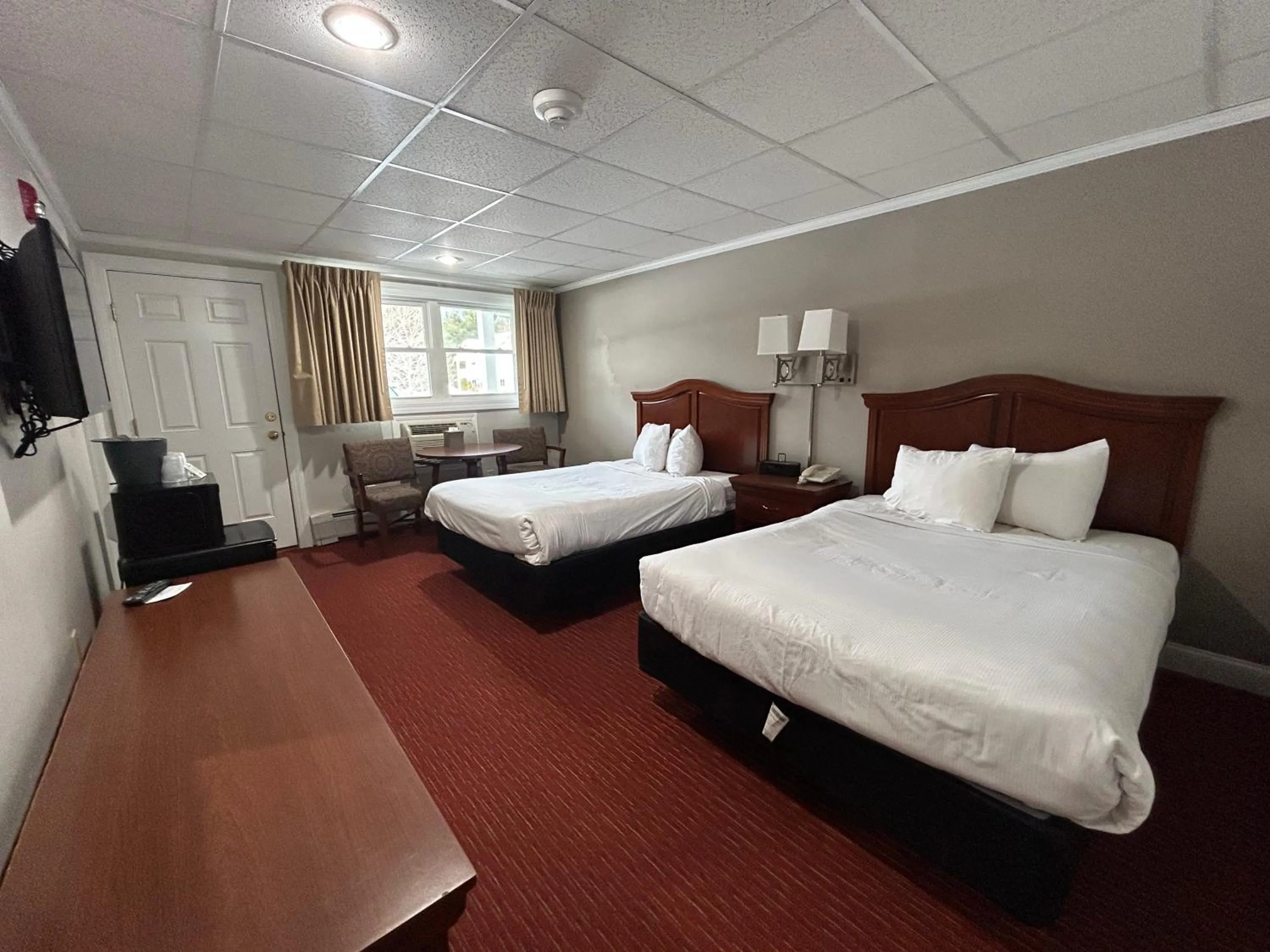 Bed in Golden Gables Inn